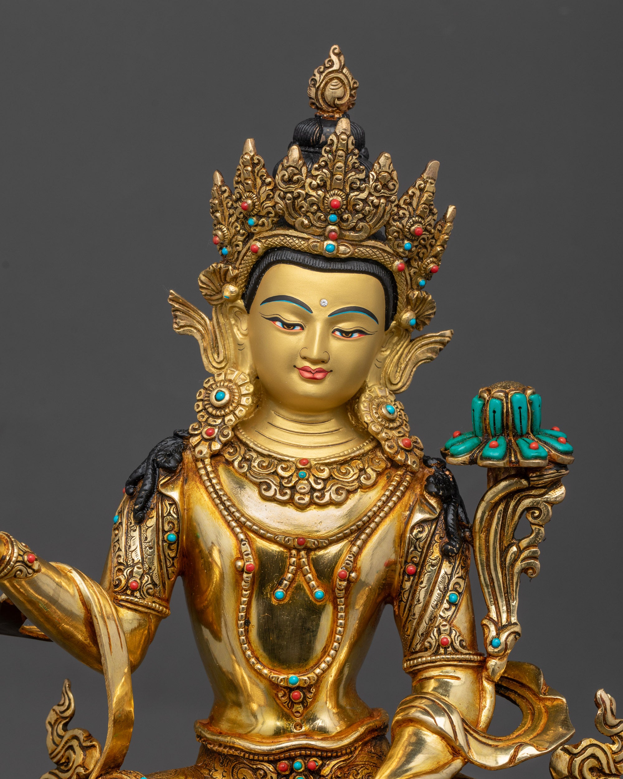 Close up Samantabhadra holding utpala flower varada mudra Tibetan Buddhist statue