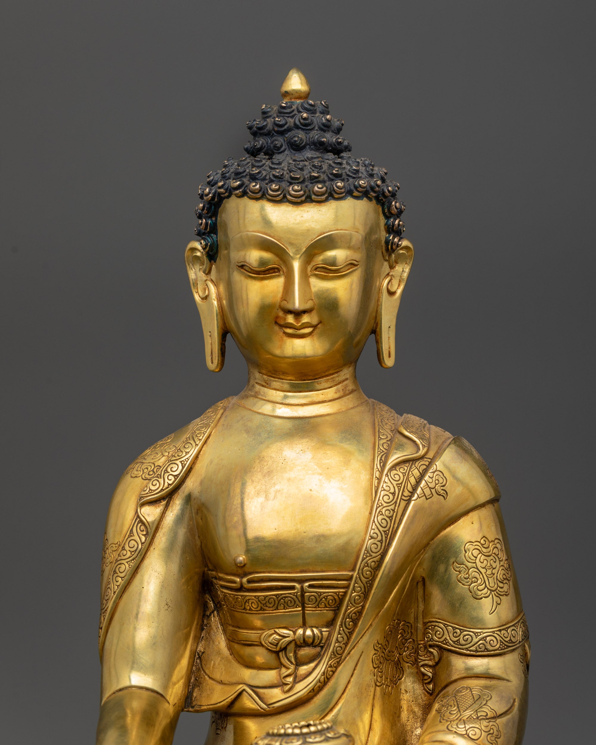Close up Smooth Shakyamuni Buddha Statue serene face with bhumisparsha mudra