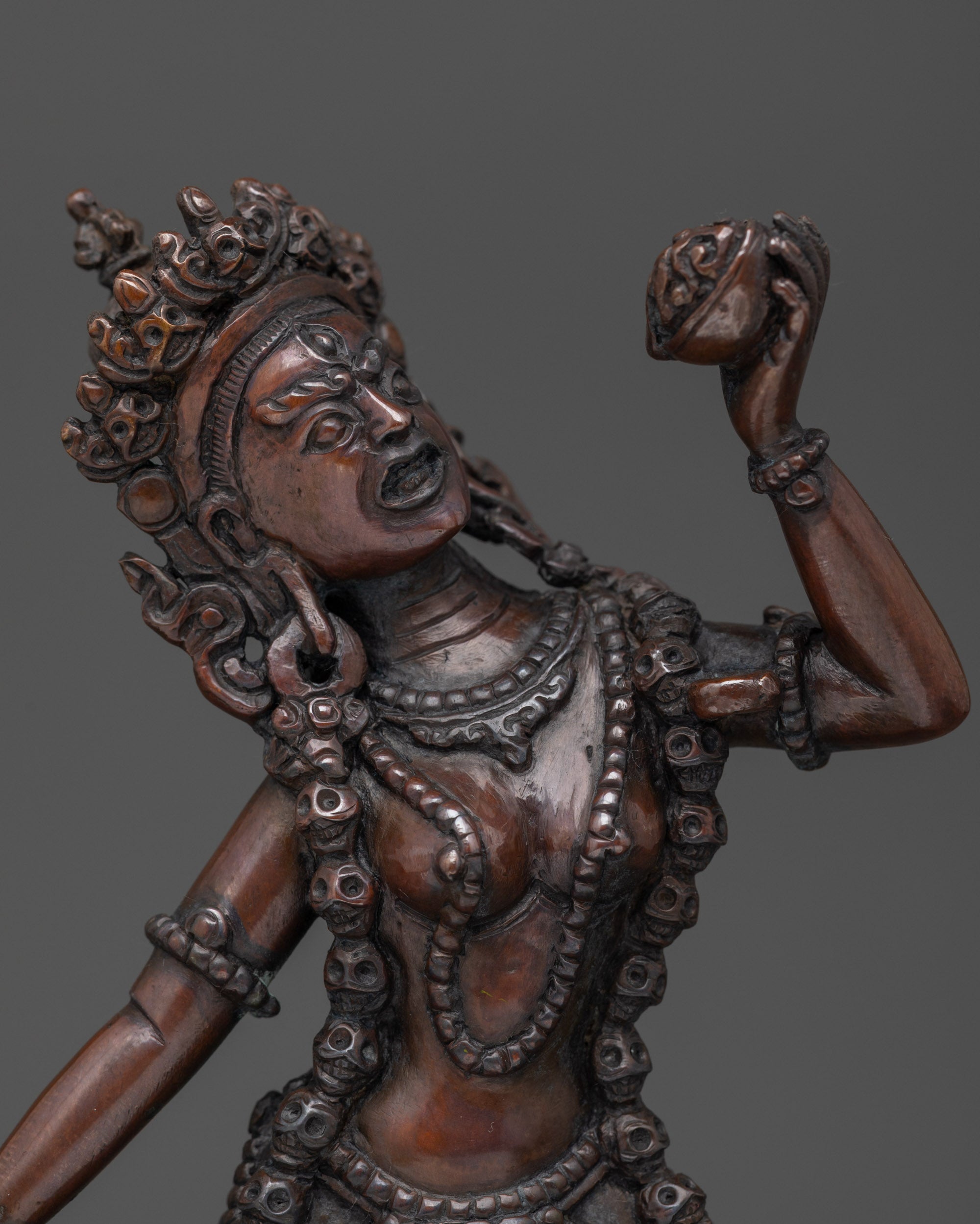 oxidized copper Buddhist dakini figure