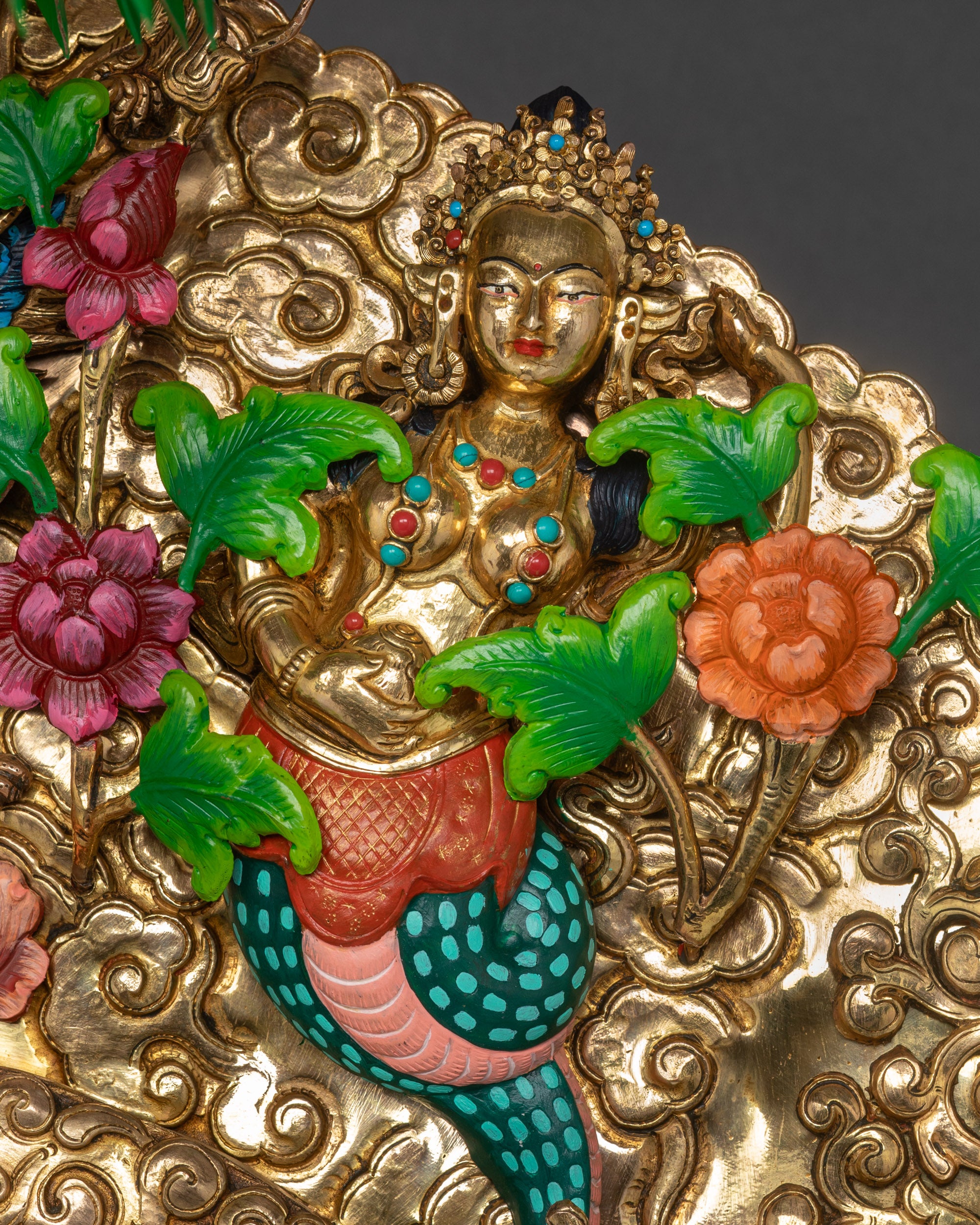 Close up carved torana seat gold-gilded Tibetan throne with floral and cloud patterns