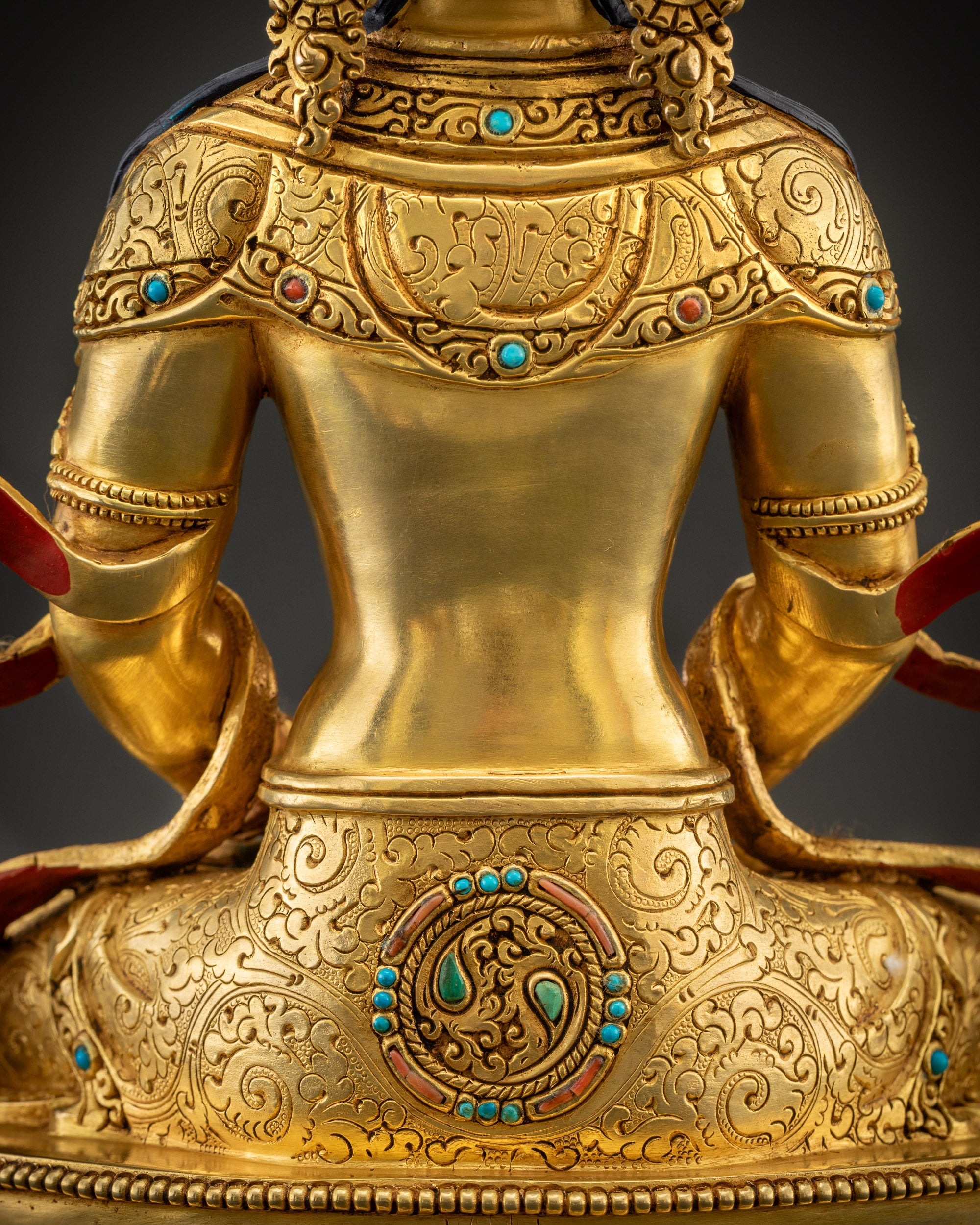 Close up detailed robe of Vairocana Buddha with radiant floral and motif carvings in gold texture