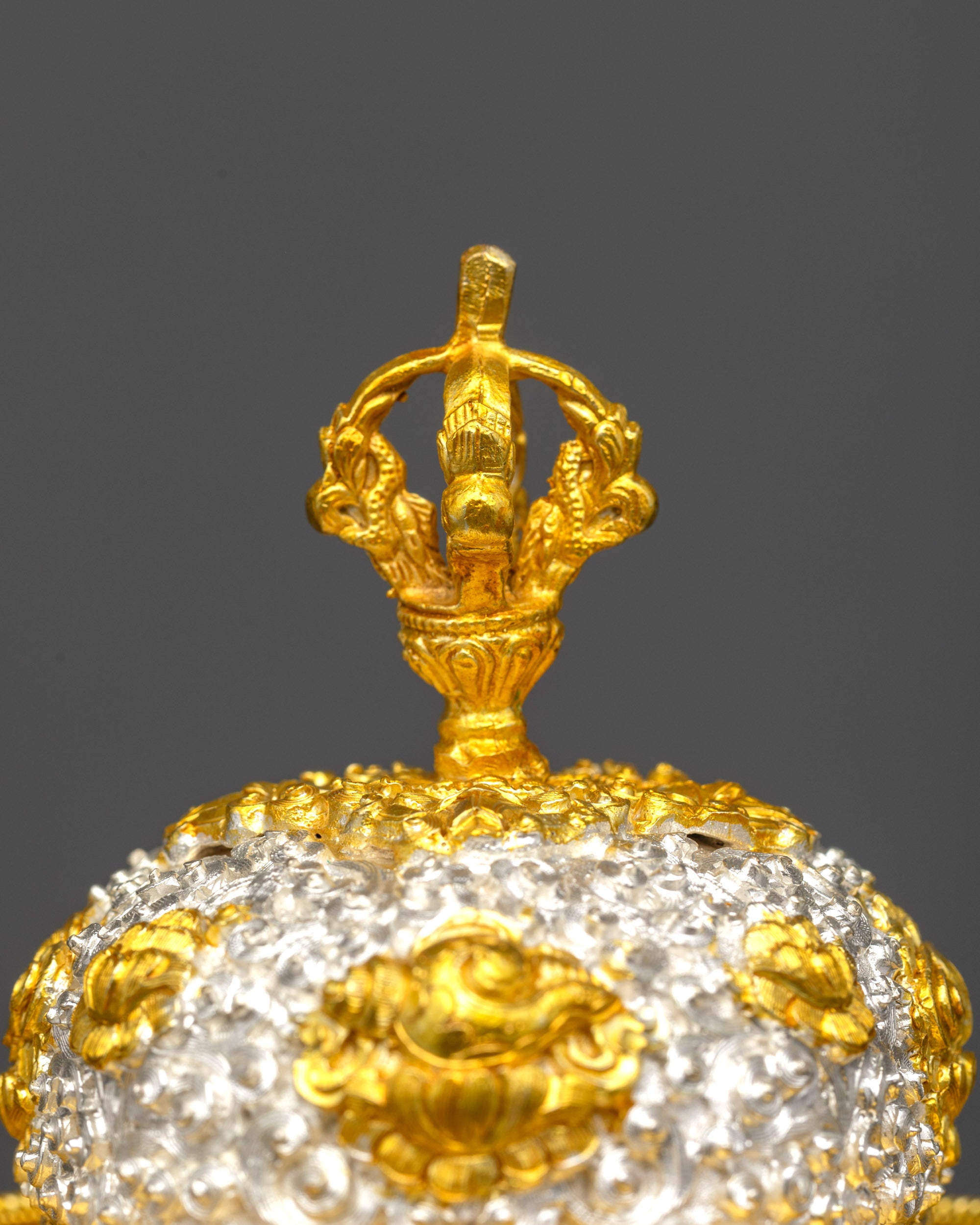 Close up main Kapala with gold-plated half vajra lid and auspicious Buddhist symbols
