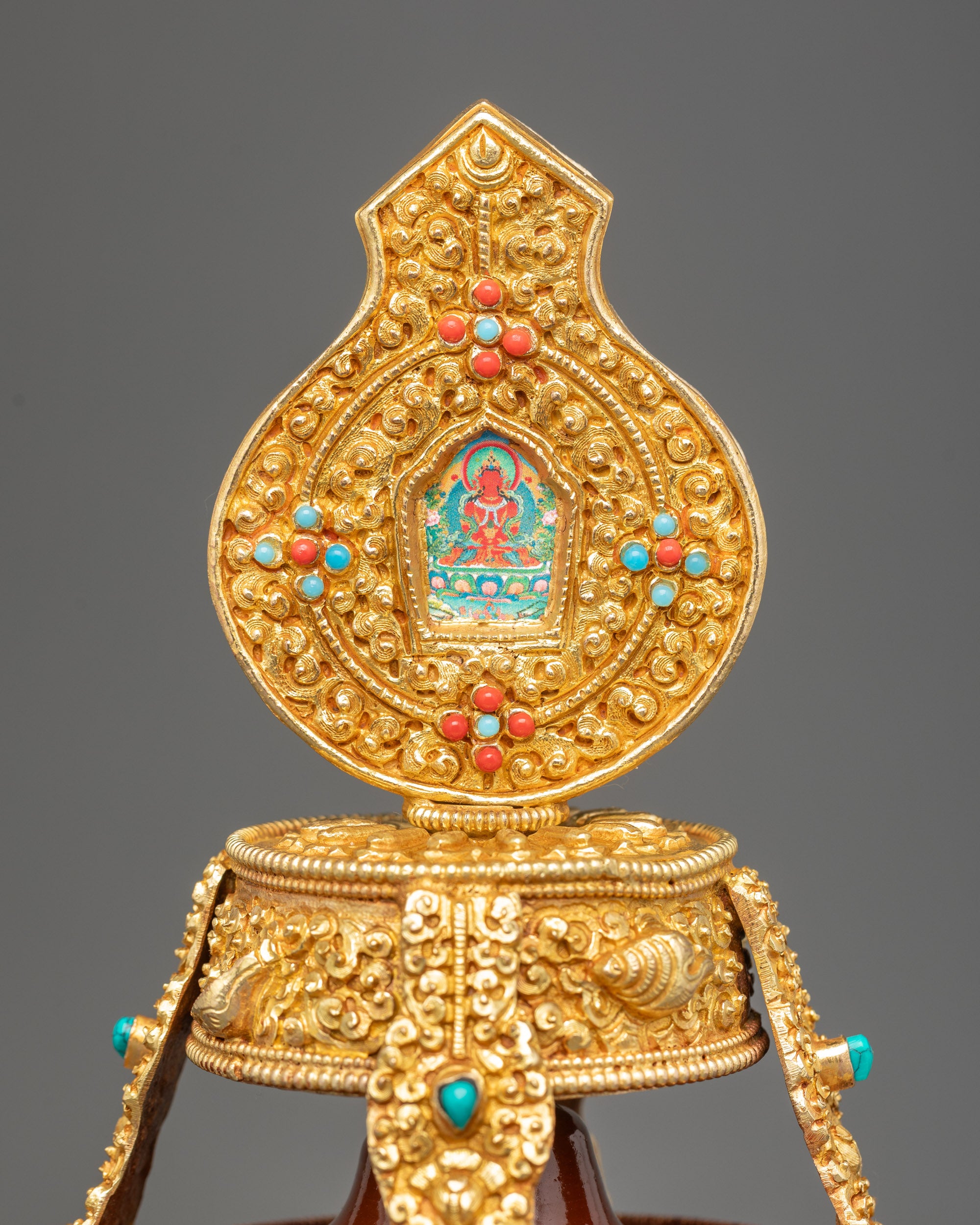 Close up of Che Bhumba lid showing floral carvings and mini Ghau box with Amitayus