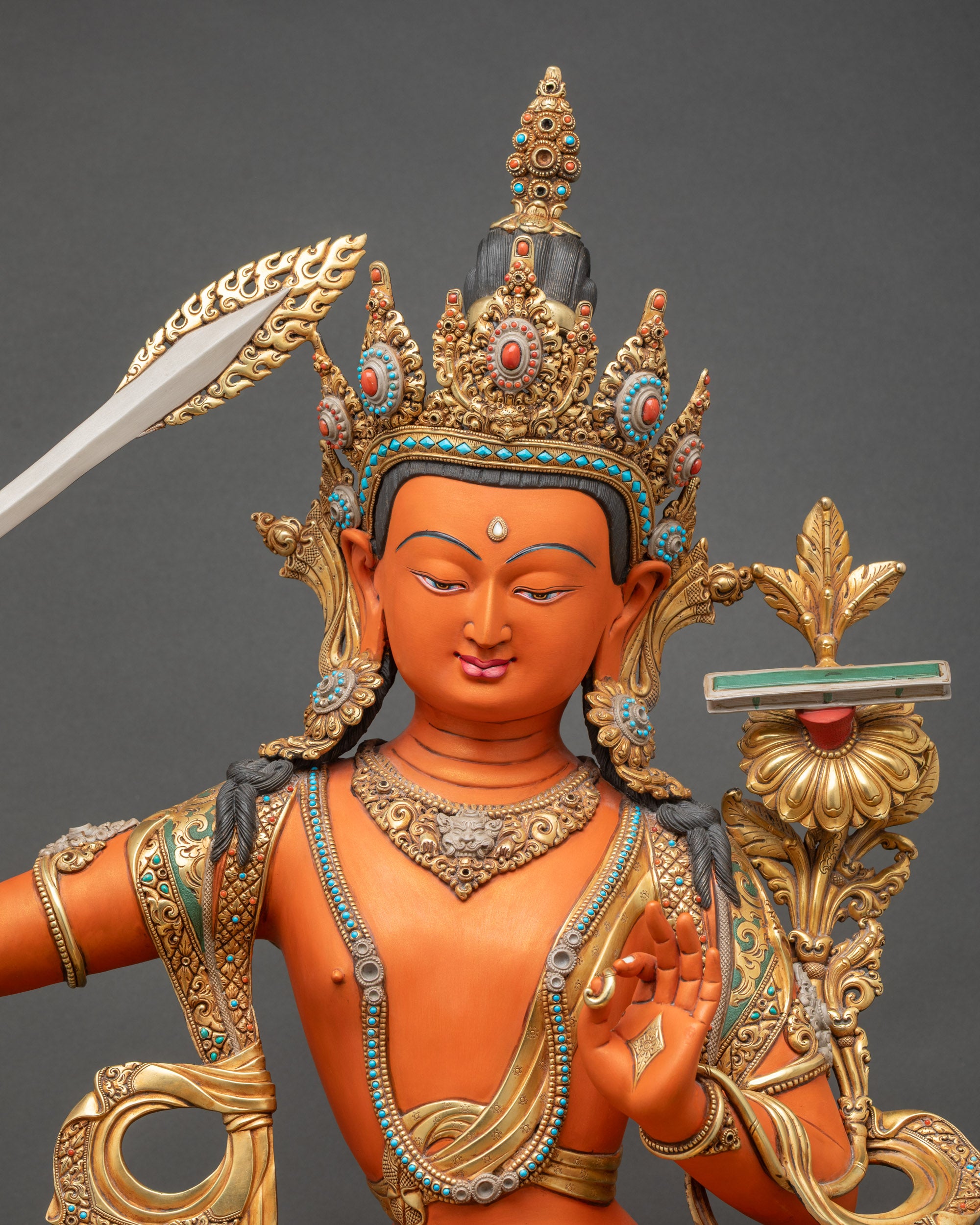 Close up of Manjushri Bodhisattva Statue β Hand Painted Acrylic Color Tibetan Figurine