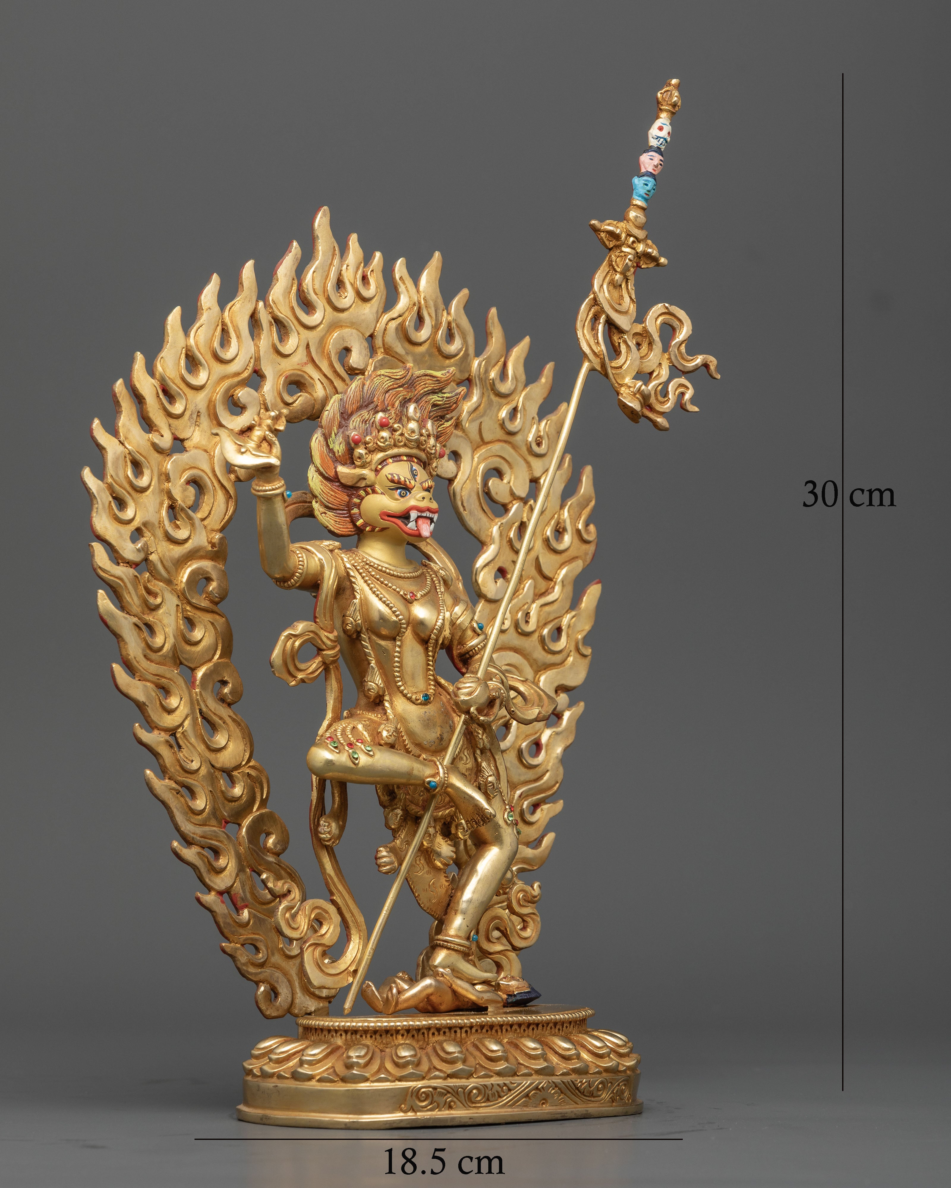 Close up of Simhamukha Statue face showing fierce expression and third eye detail