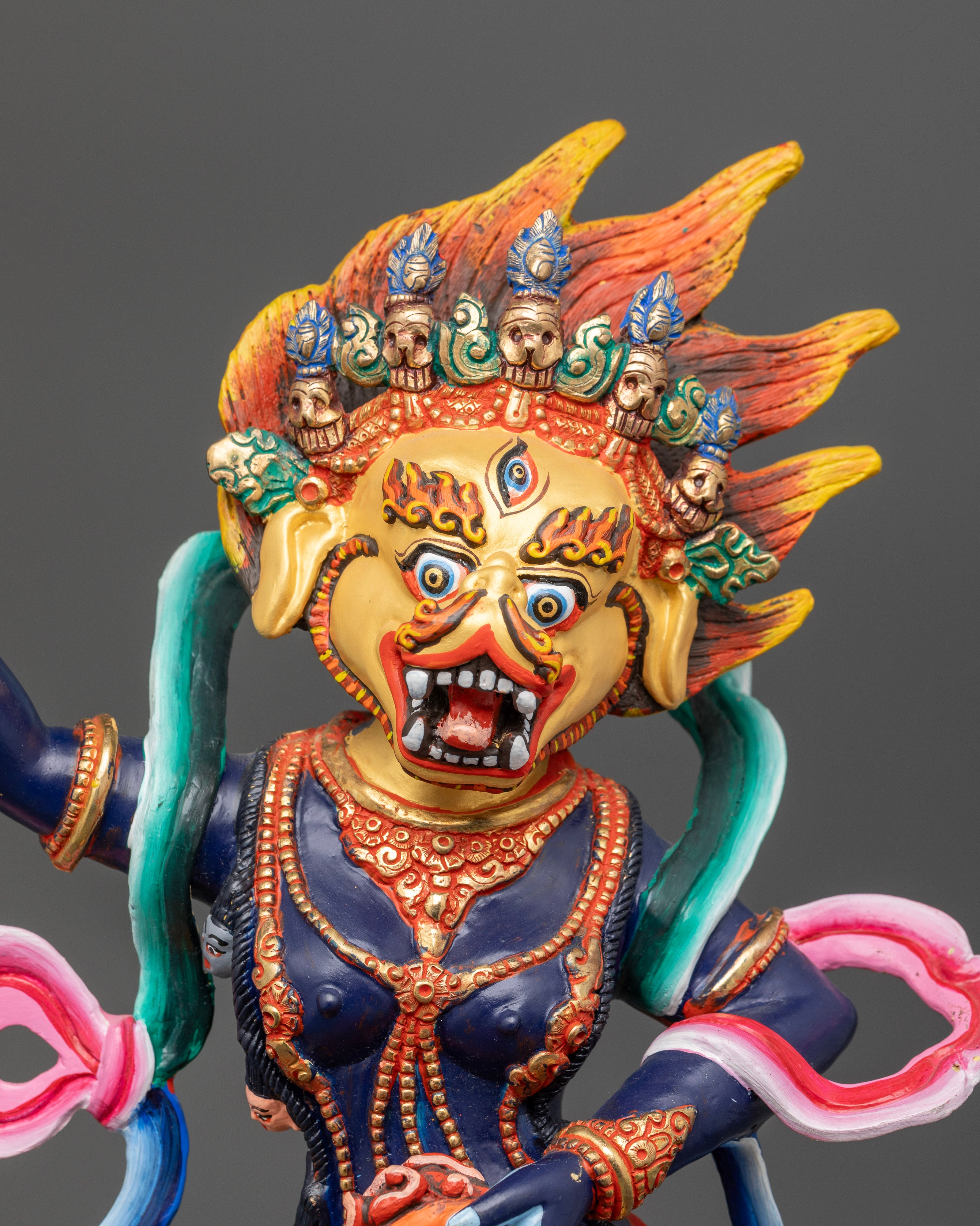 Close up of Simhamukha Statue showing hand-painted acrylic colors and ornate artwork