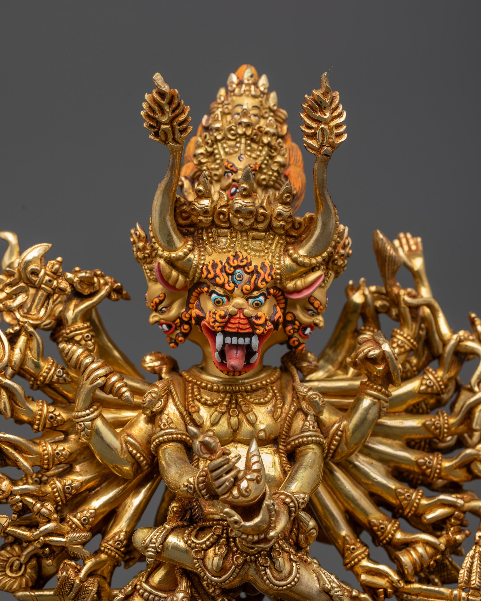 Close up of Yamantaka’s skull garland, crowns, jewelry, and sacred objects in detail