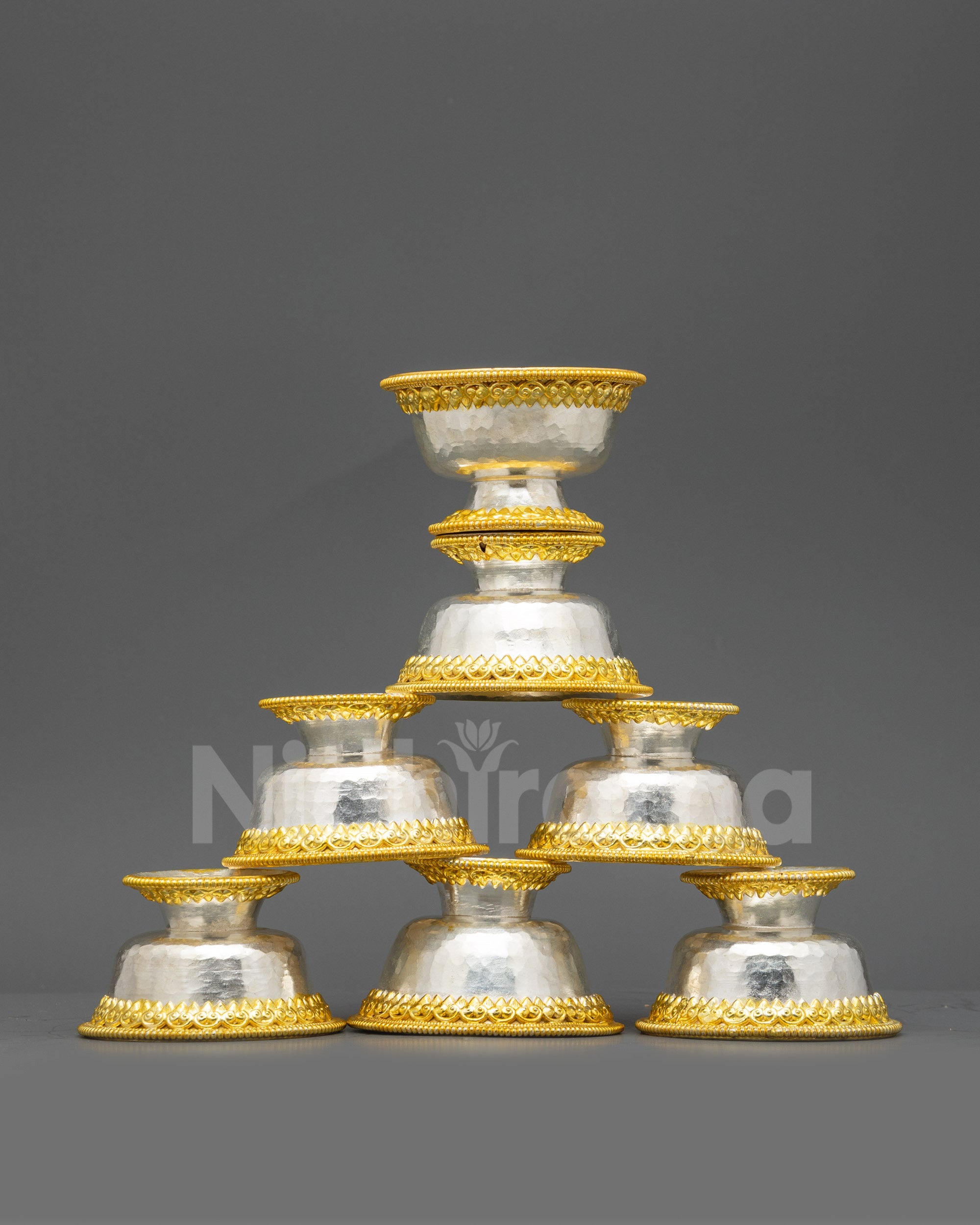 Close up of deity inside Water Offering Bowl, detailed filigree & semi-precious stones