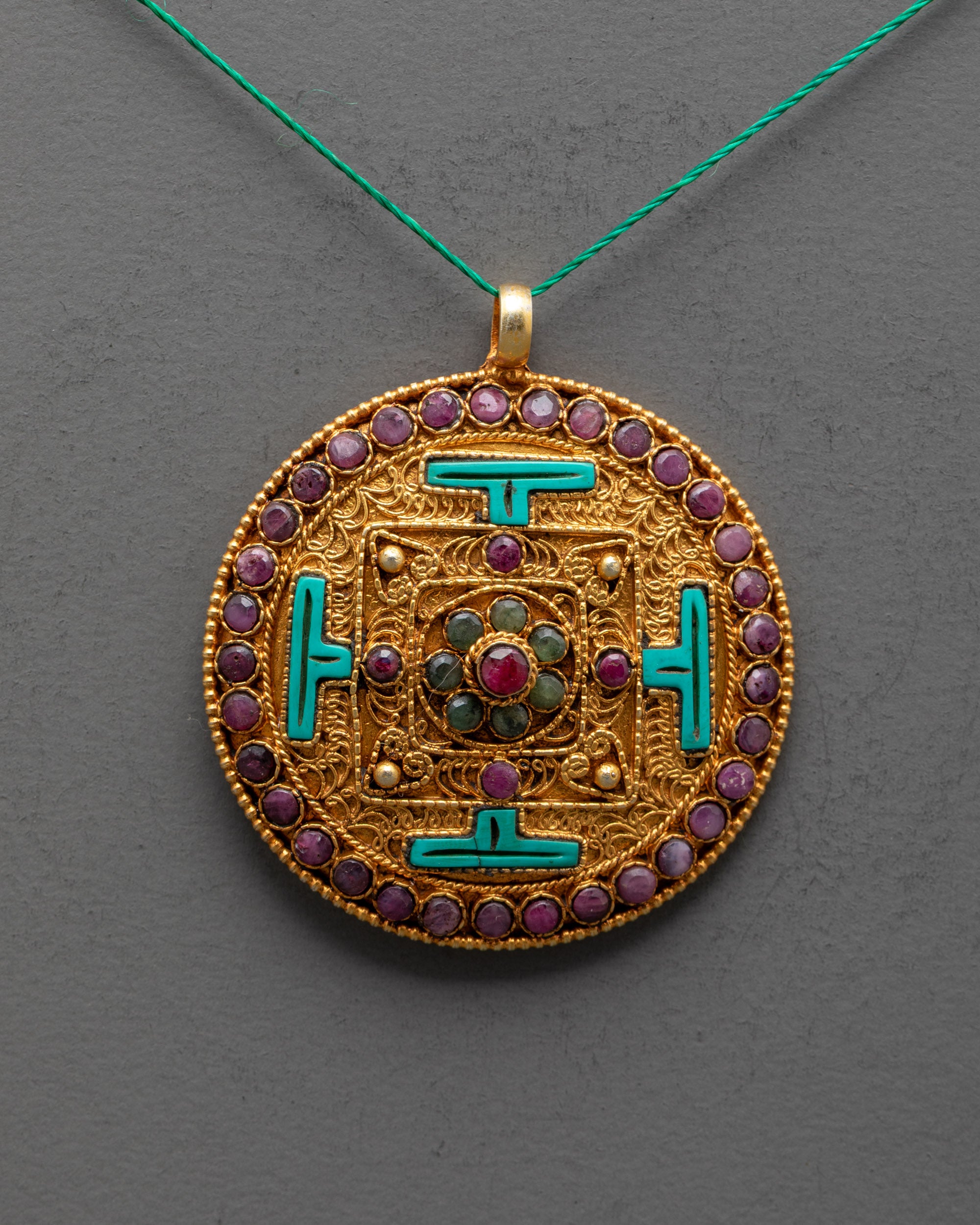 Close up of detailed filigree design on Mandala Locket handcrafted by Nepalese artisans