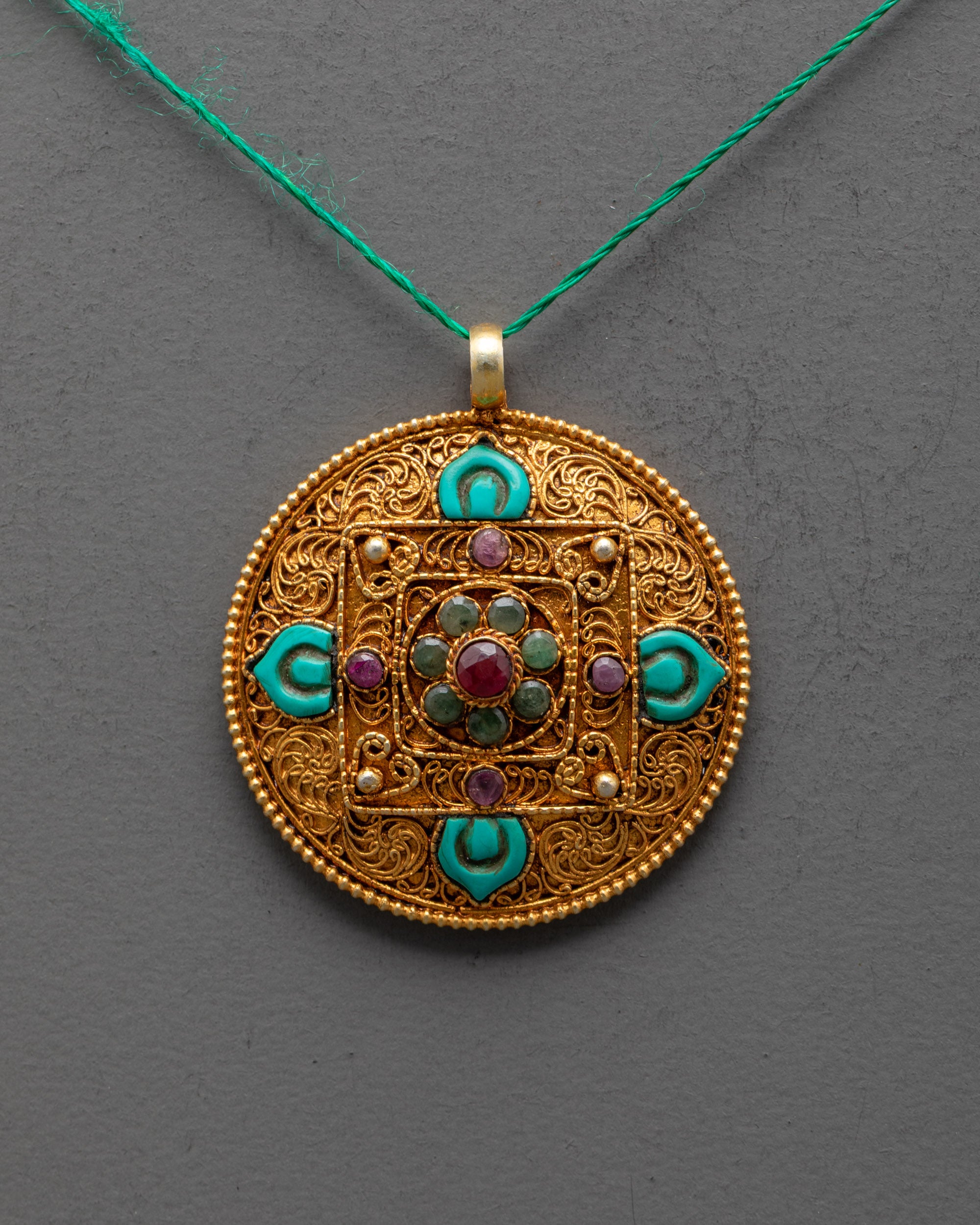 Close up of intricate filigree design on Mandala Pendant handcrafted by Nepal artisans