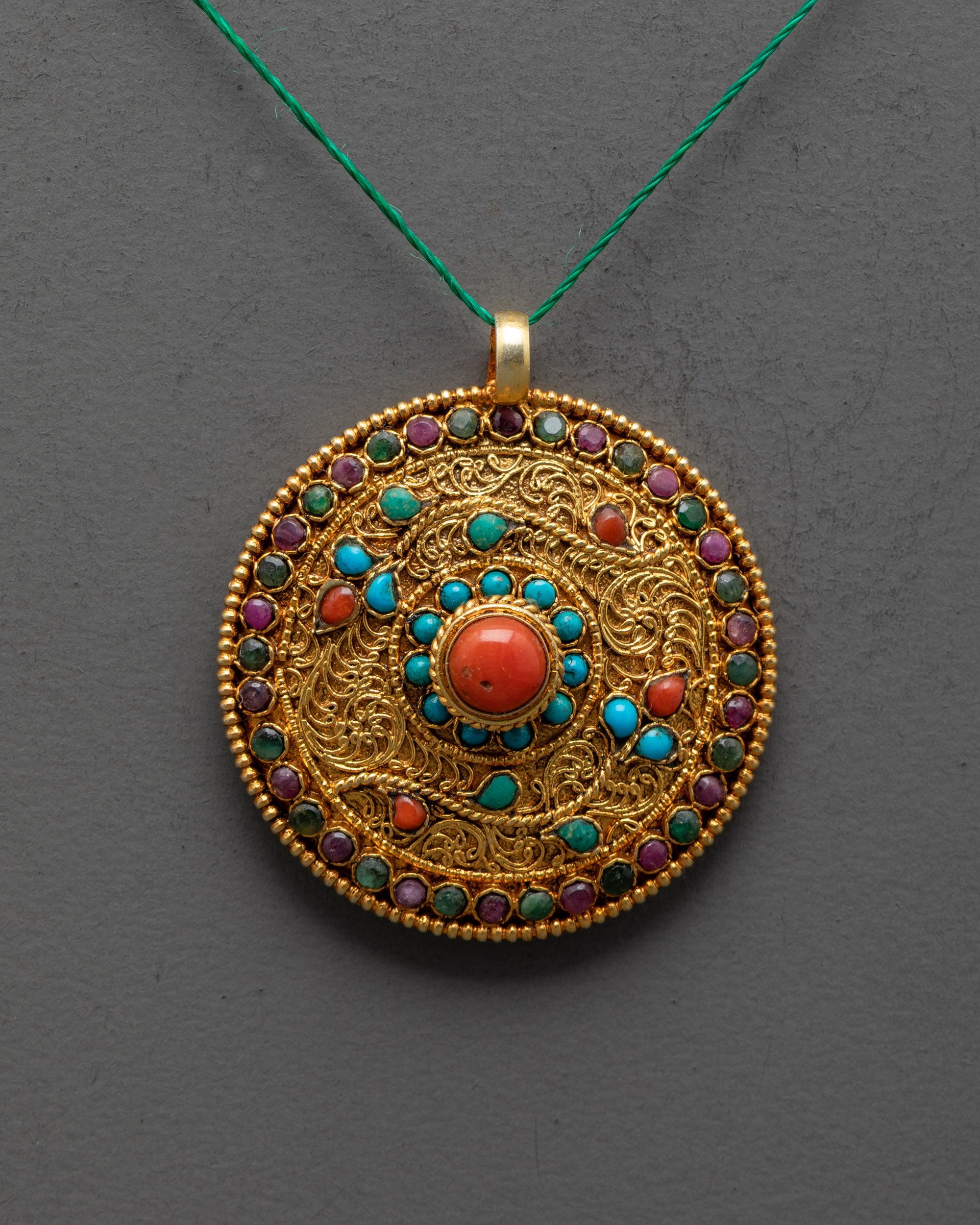 Close up of intricate filigree design on Nepalese Flower Locket pendant