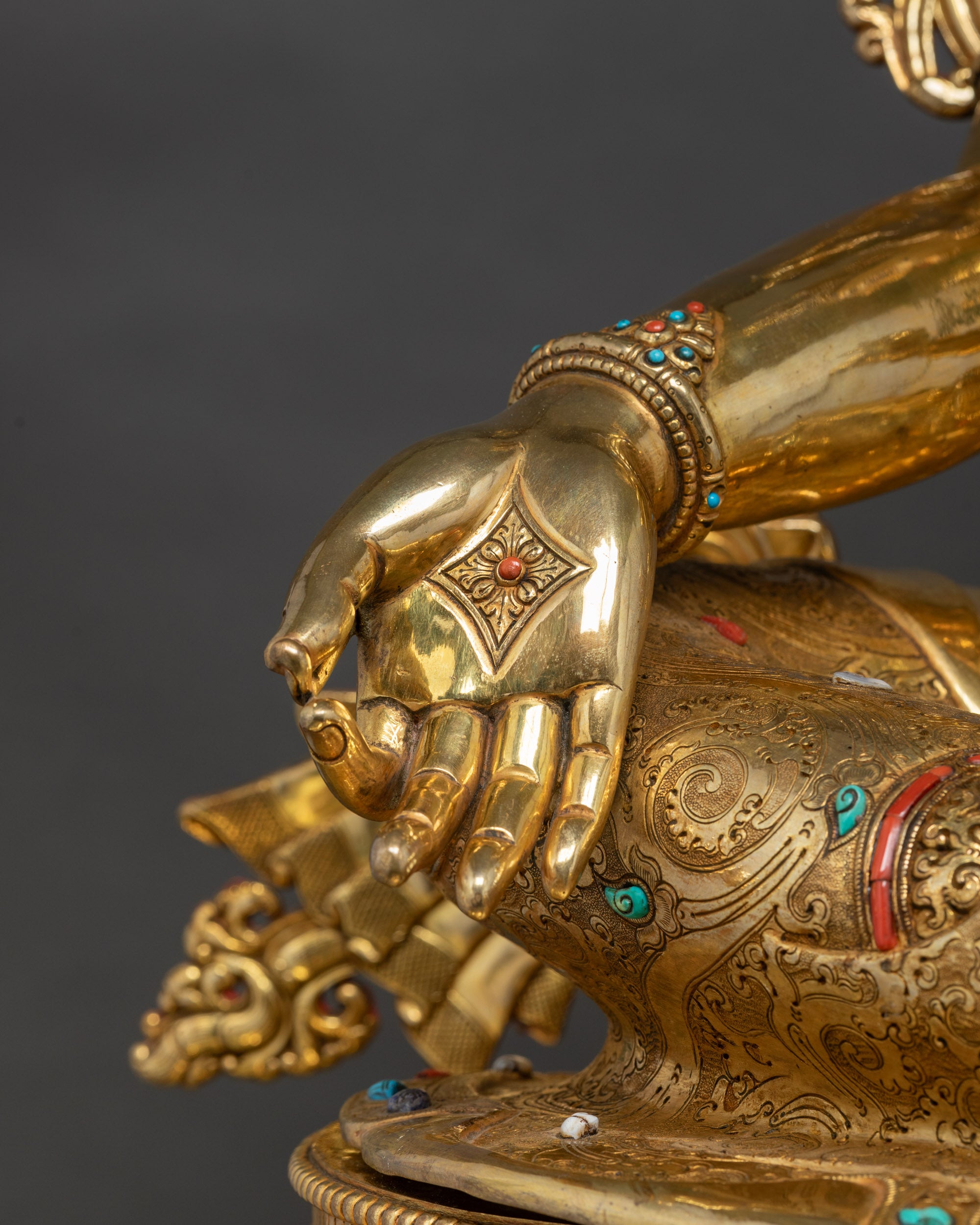 Close up of varada mudra right hand of Green Tara Statue for spiritual decor