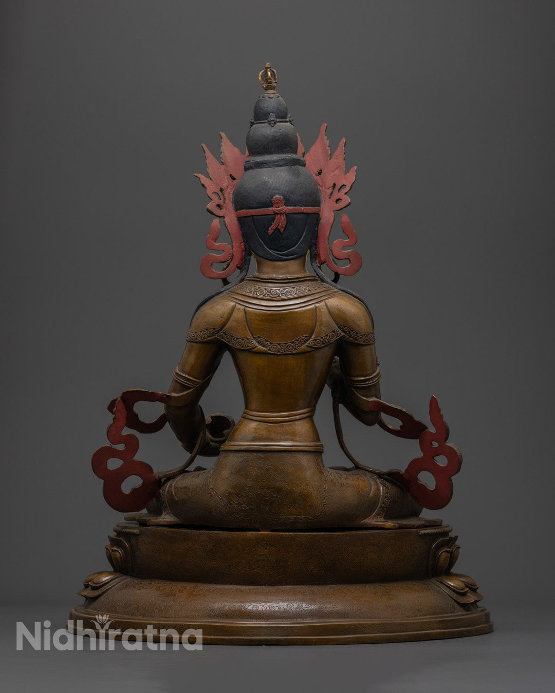 Consecrated hollow space at base of Vajrasattva statue for storing purification mantras or sacred relics