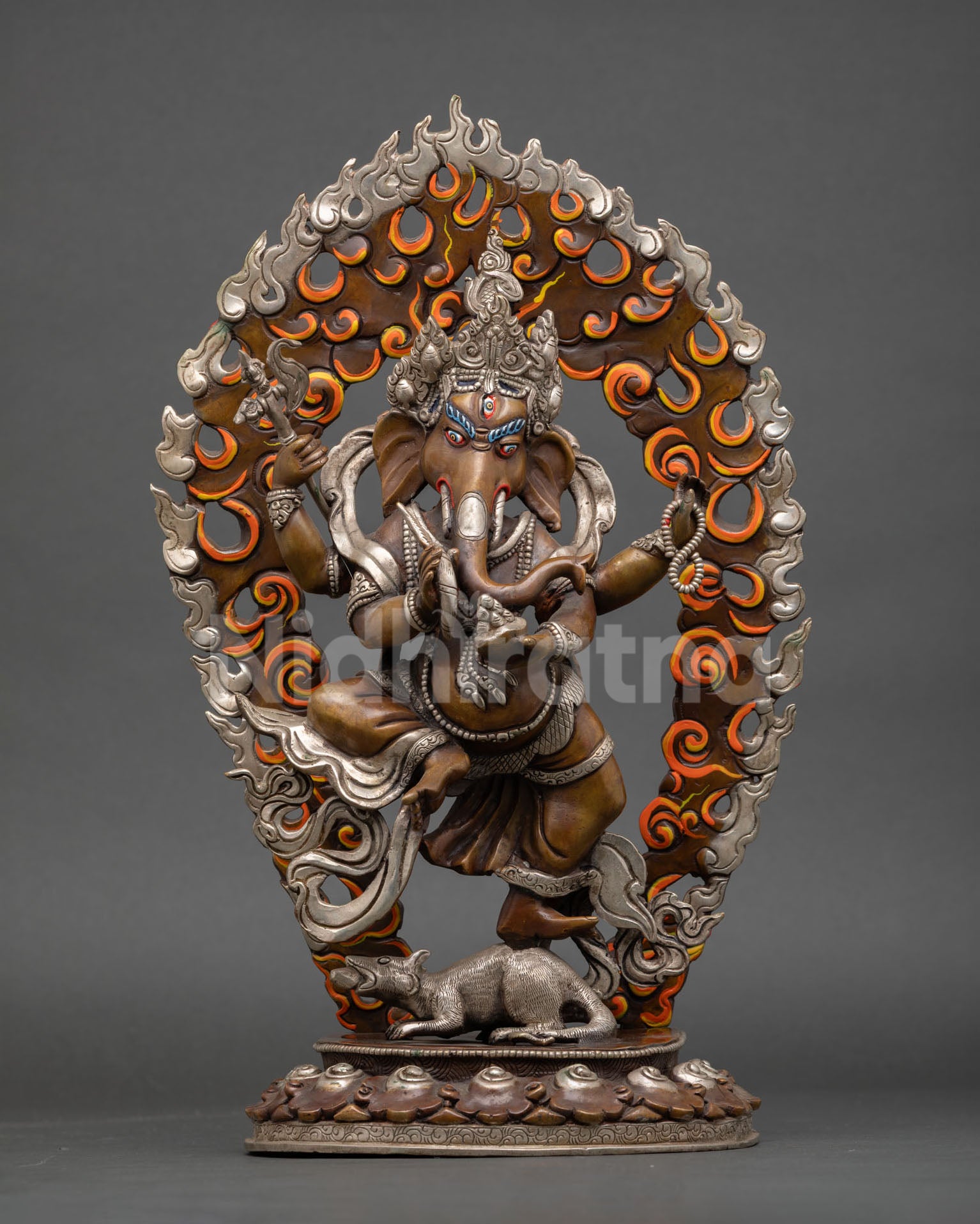 Dancing Ganesha statue on lotus throne, oxidized copper and silver-plated Nepalese artwork