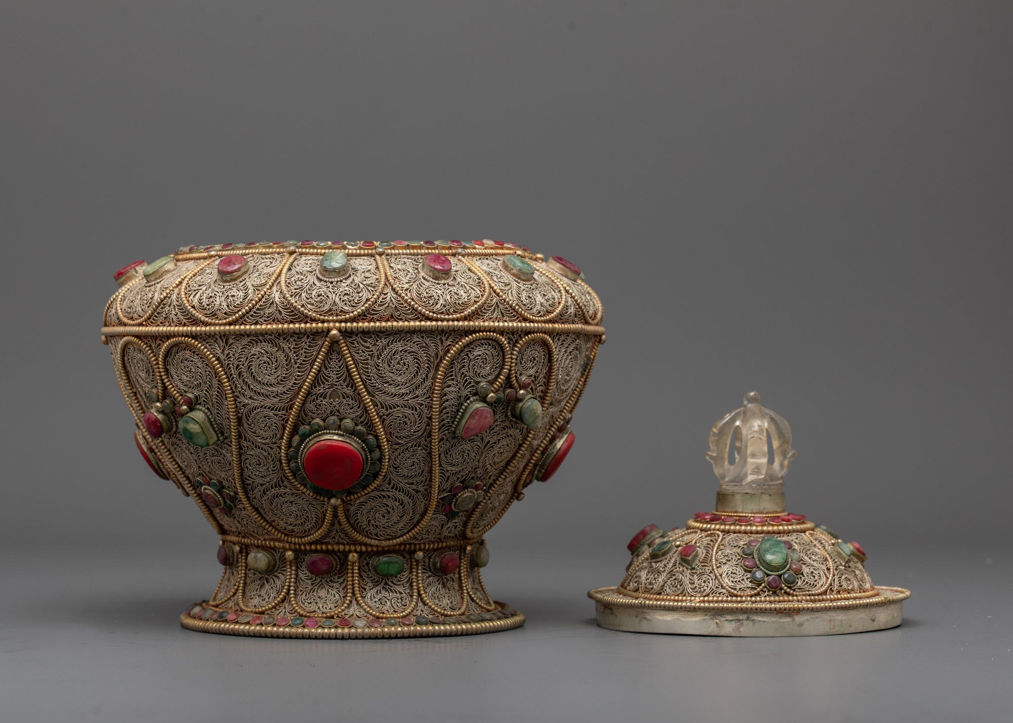 Decorative semi-precious stones and carved on traditional Tibetan rice pot