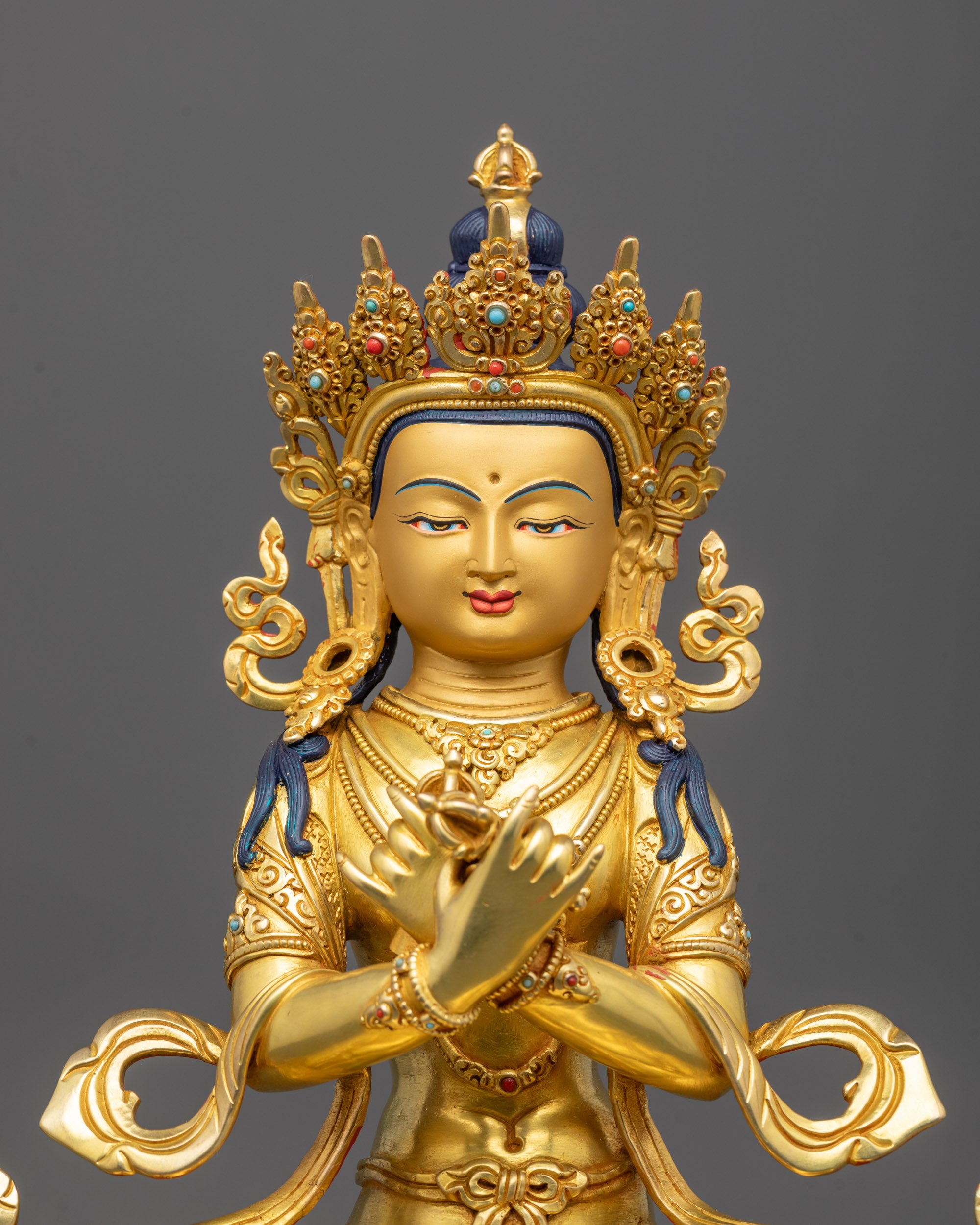 Detailed close-up of Vajradhara Statue showing intricate gold gilding