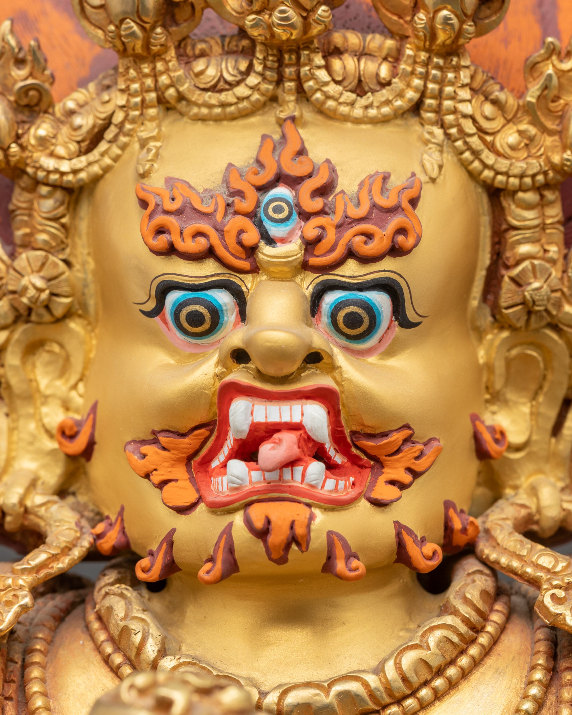 Detailed close up face Black Dzambhala with semi-precious stones and Wrathflame halo