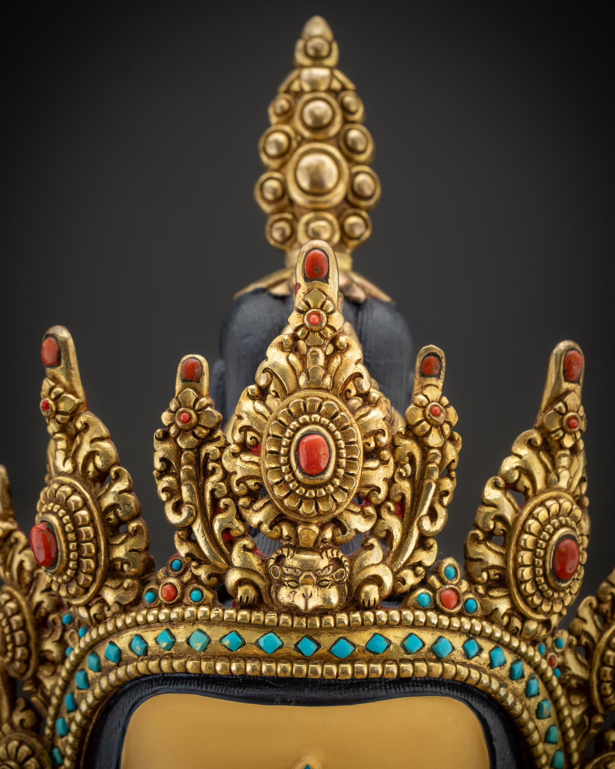 Detailed close up five-jeweled crown on Avalokiteshvara Bodhisattva statue