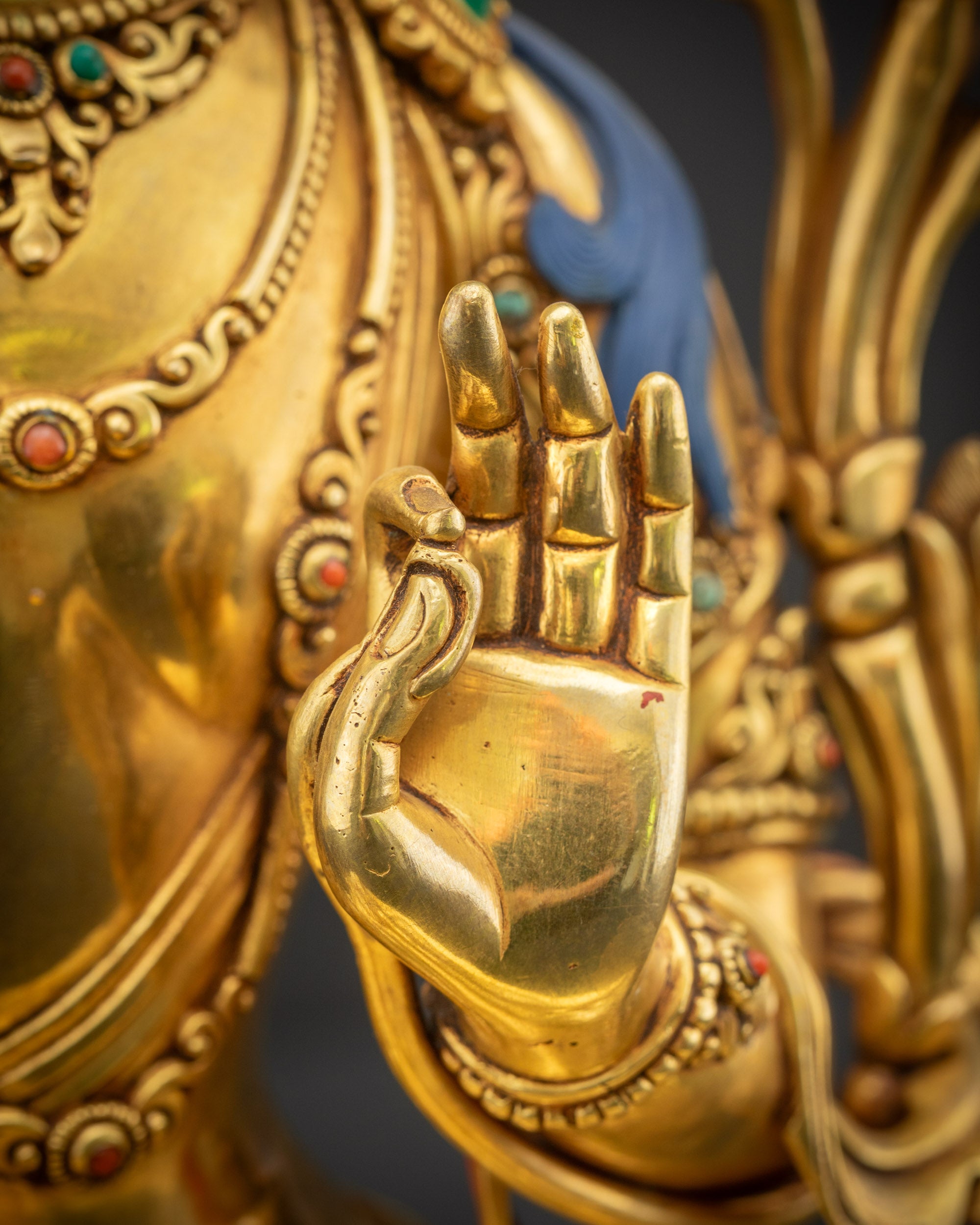 Detailed close up of Manjushri Abhaya Mudra hand gesture