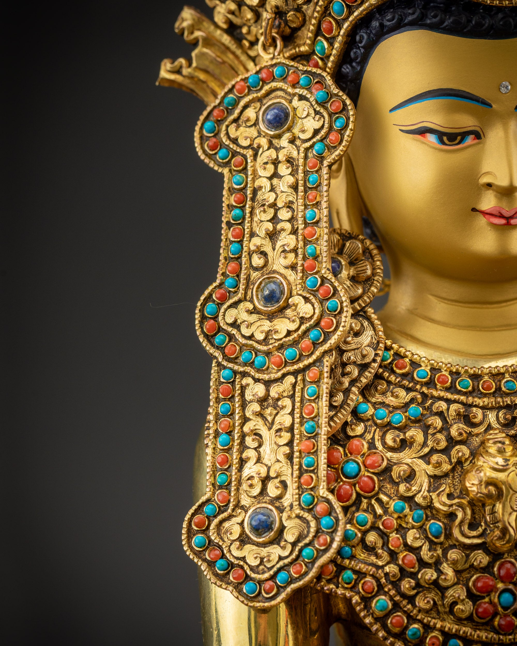 Detailed left side earrings of handcrafted Jowo Rinpoche Buddha statue