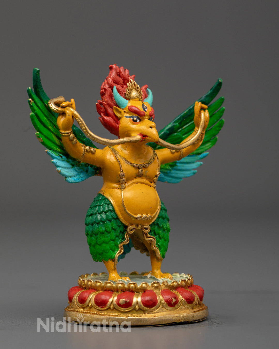 Detailed lotus throne supporting Garuda Dev figurine symbolizing purity and spiritual transcendence