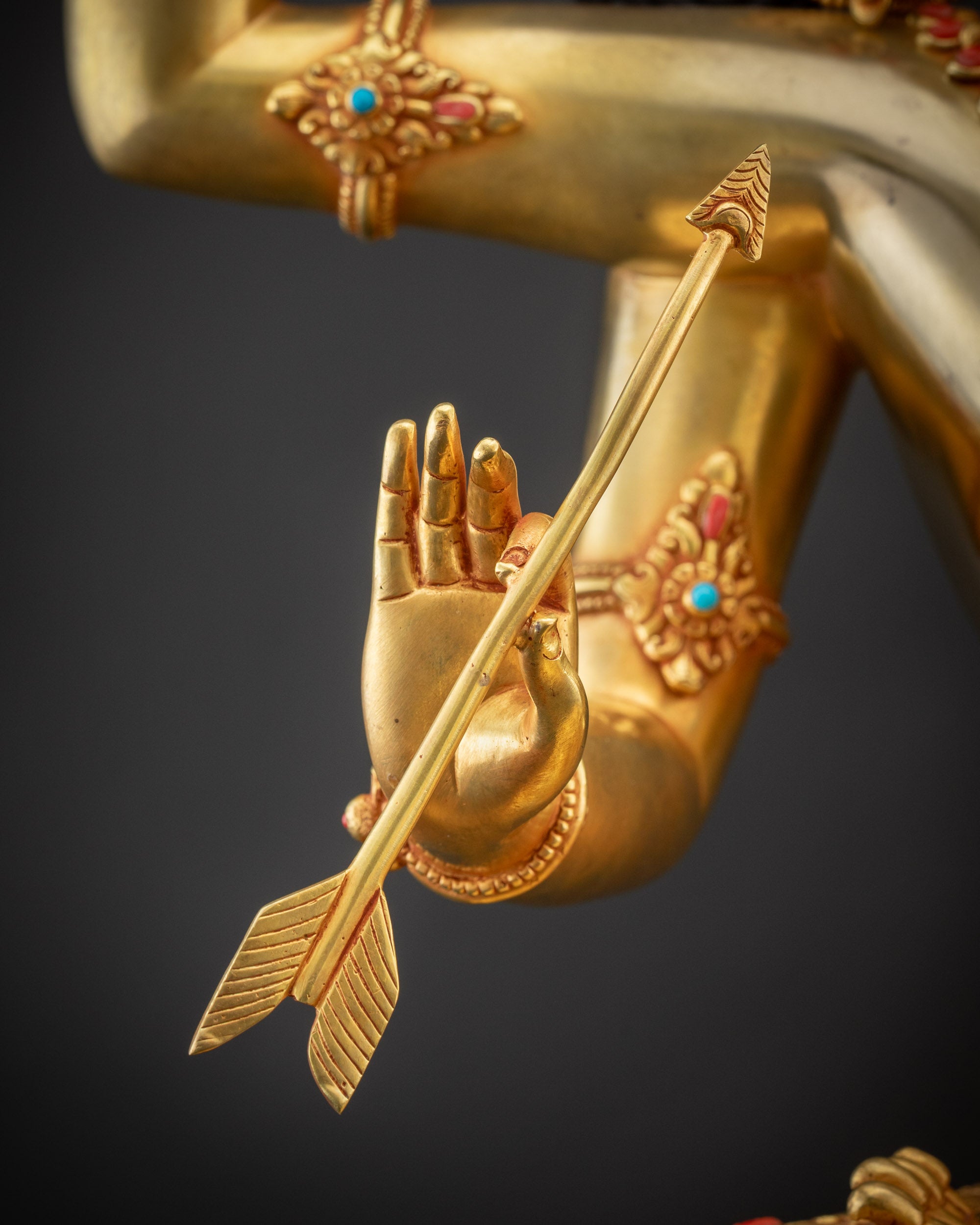 Detailed shot Maha Manjushri Statue arrow crafted with traditional detailing