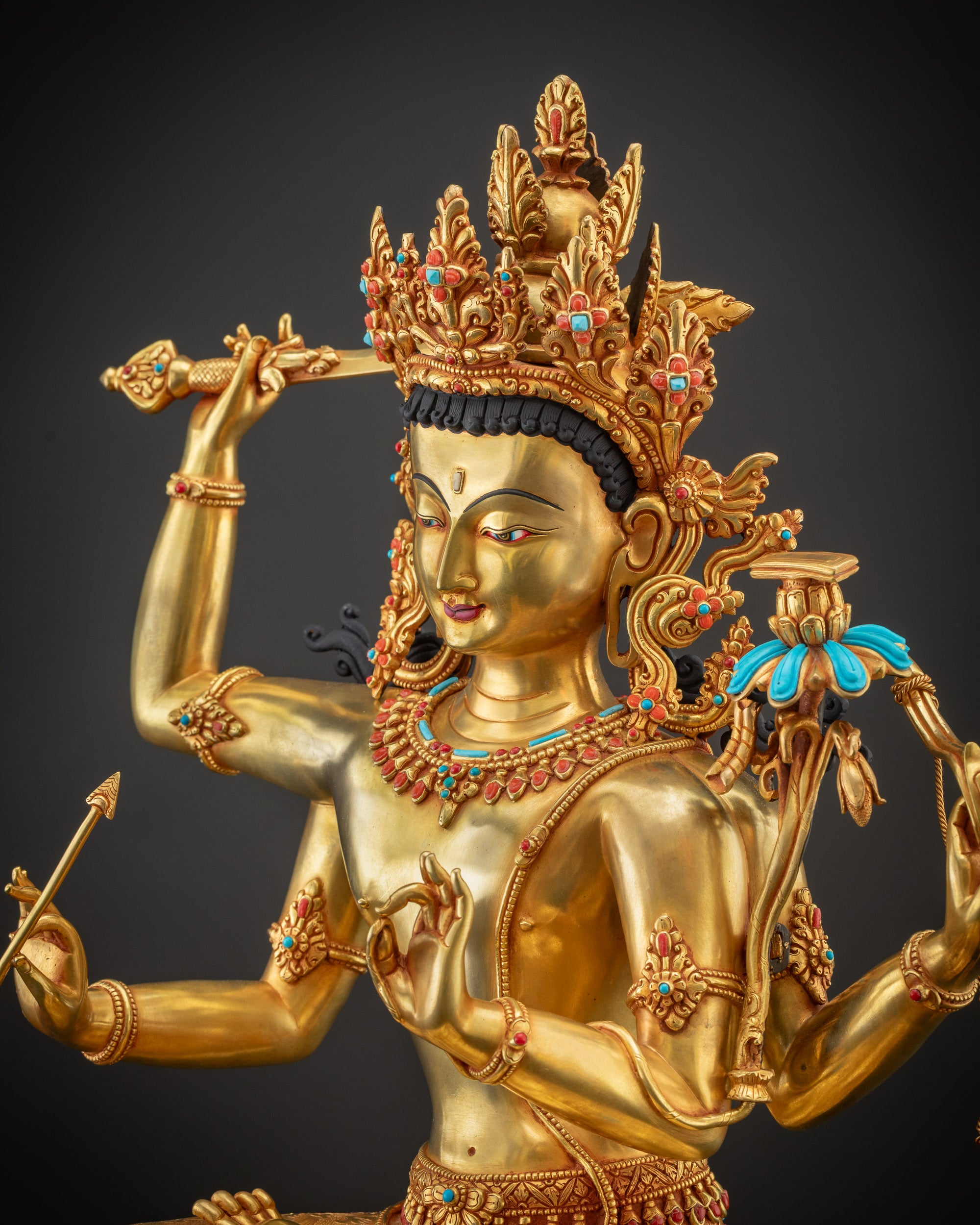 Detailed side Maha Manjushri Statue intricate carvings with semi precious stones and gold sheen