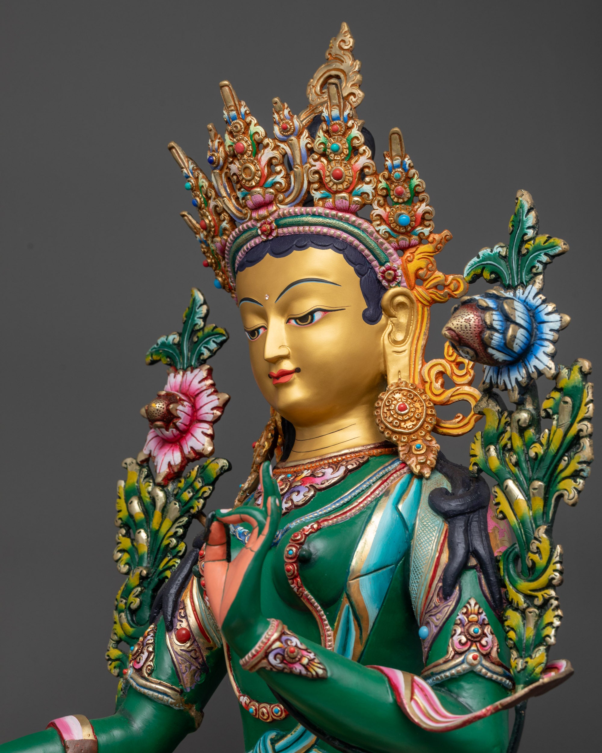Detailed side close up Green Tara statue side view showing divine feminine energy