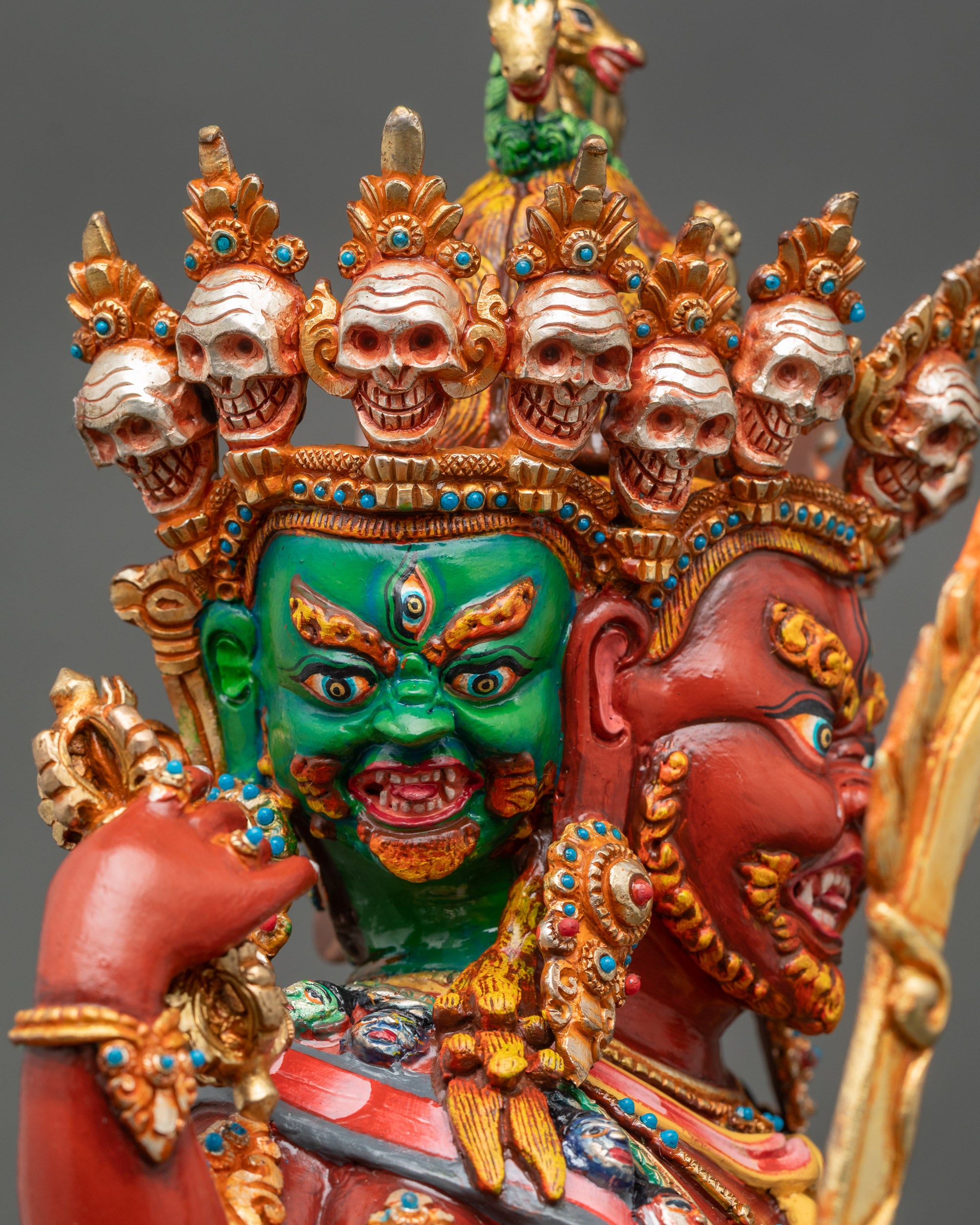 Detailed side close up: Side view close-up of Hayagriva statue, handcrafted copper detailing