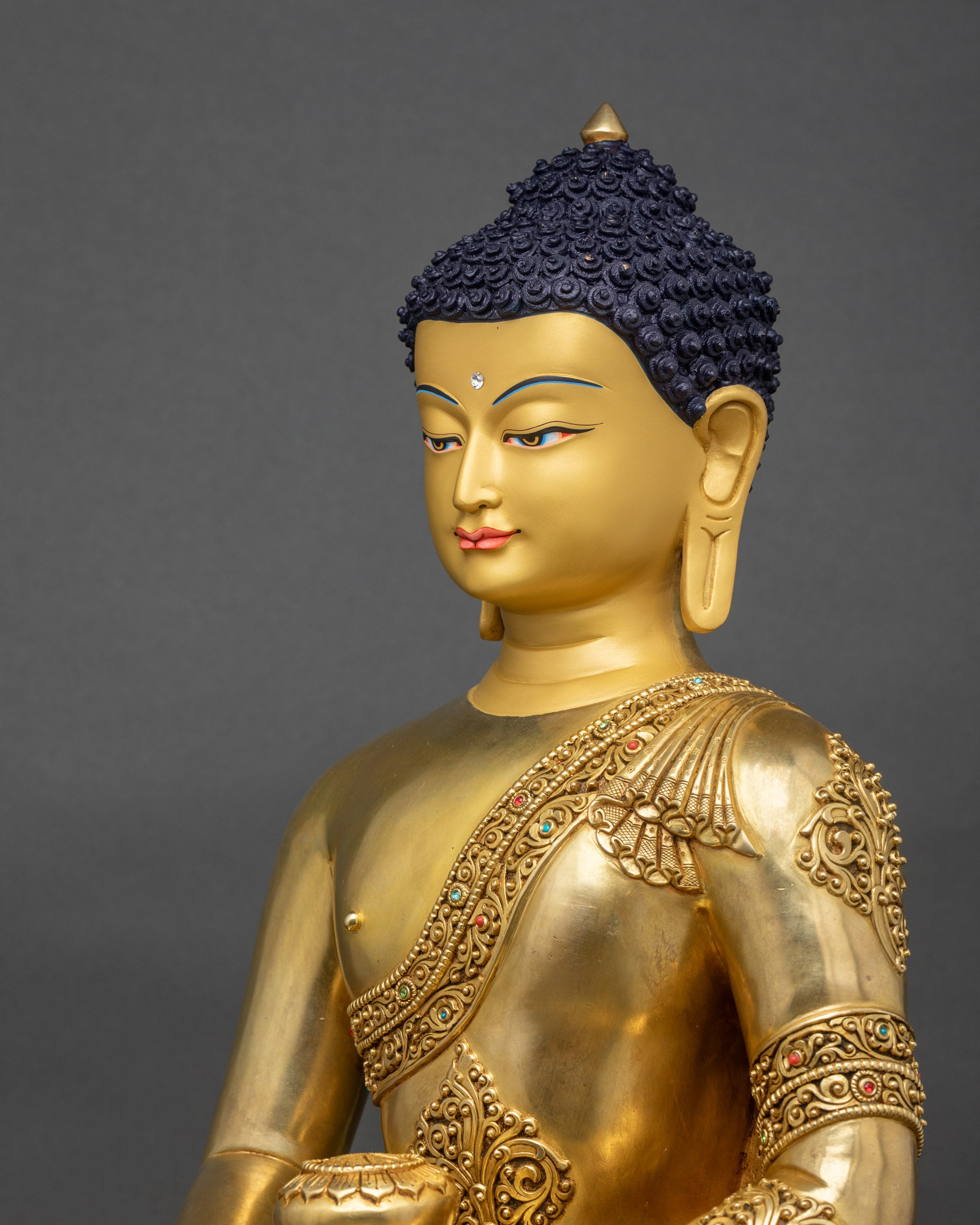 Detailed side close up of Amitabha robe with floral carvings and gilded details