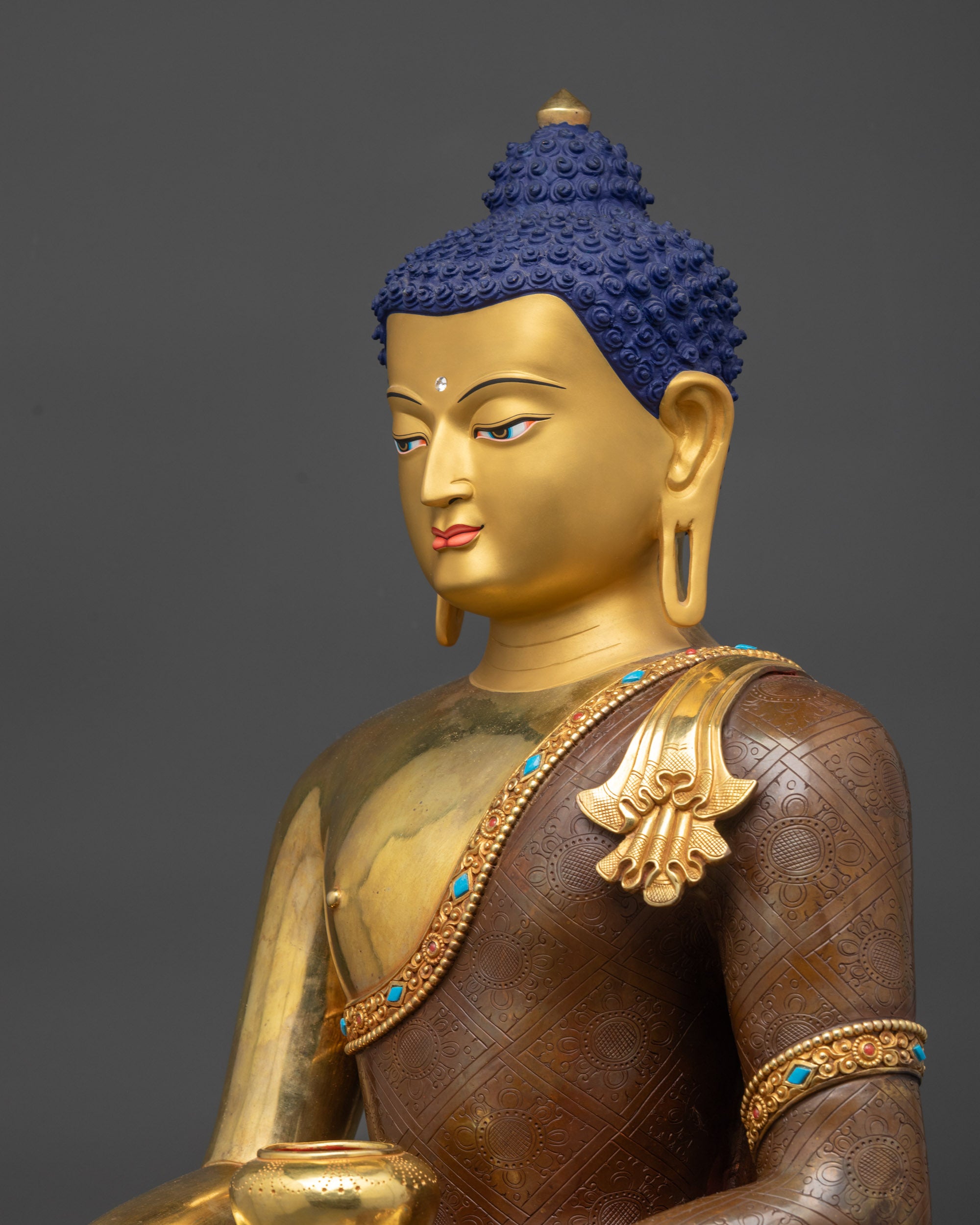 Detailed side close up of Gautama Buddha Statue displaying earth-touching mudra and bowl