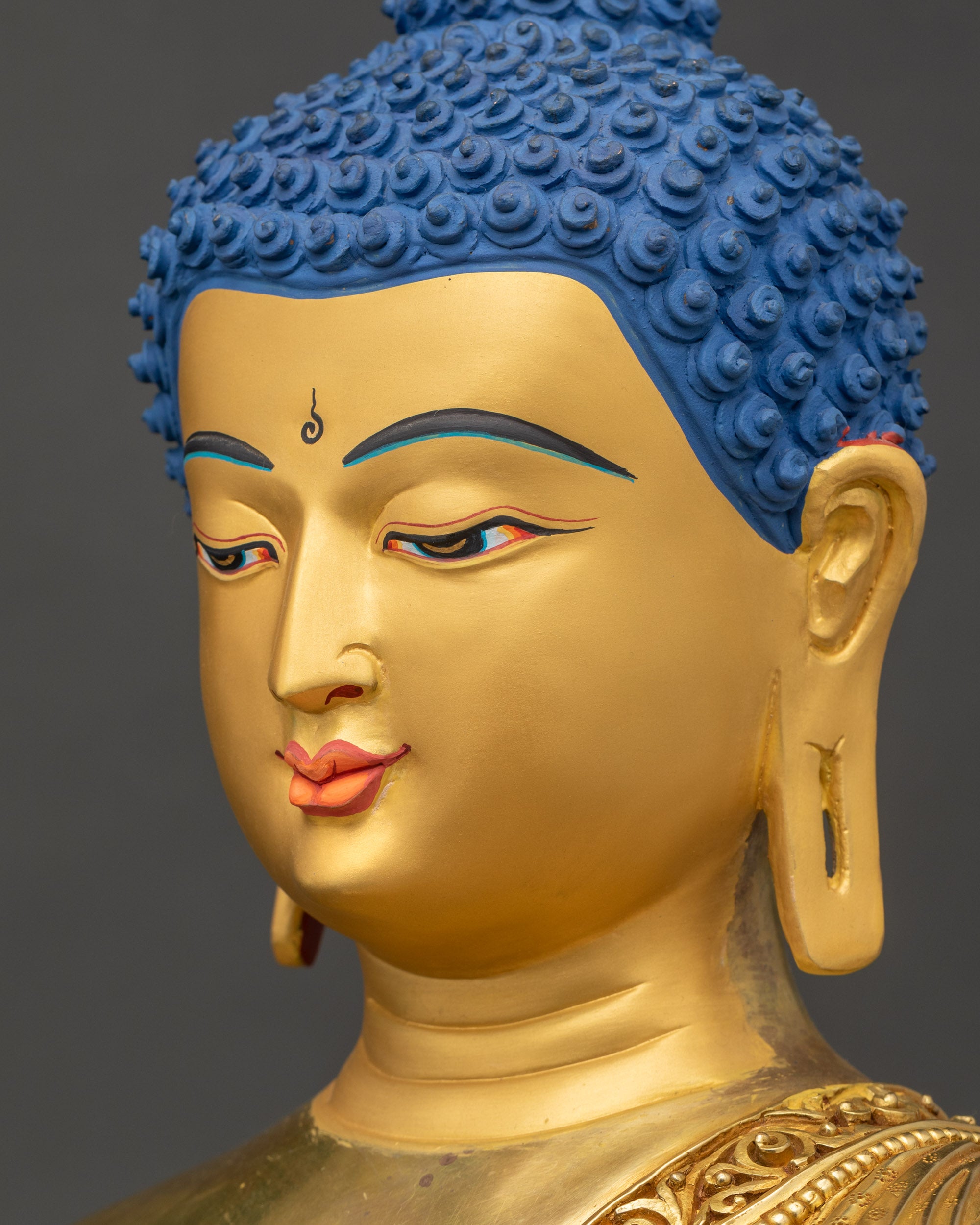 Detailed side close up of Medicine Buddha face with halo and calm gaze