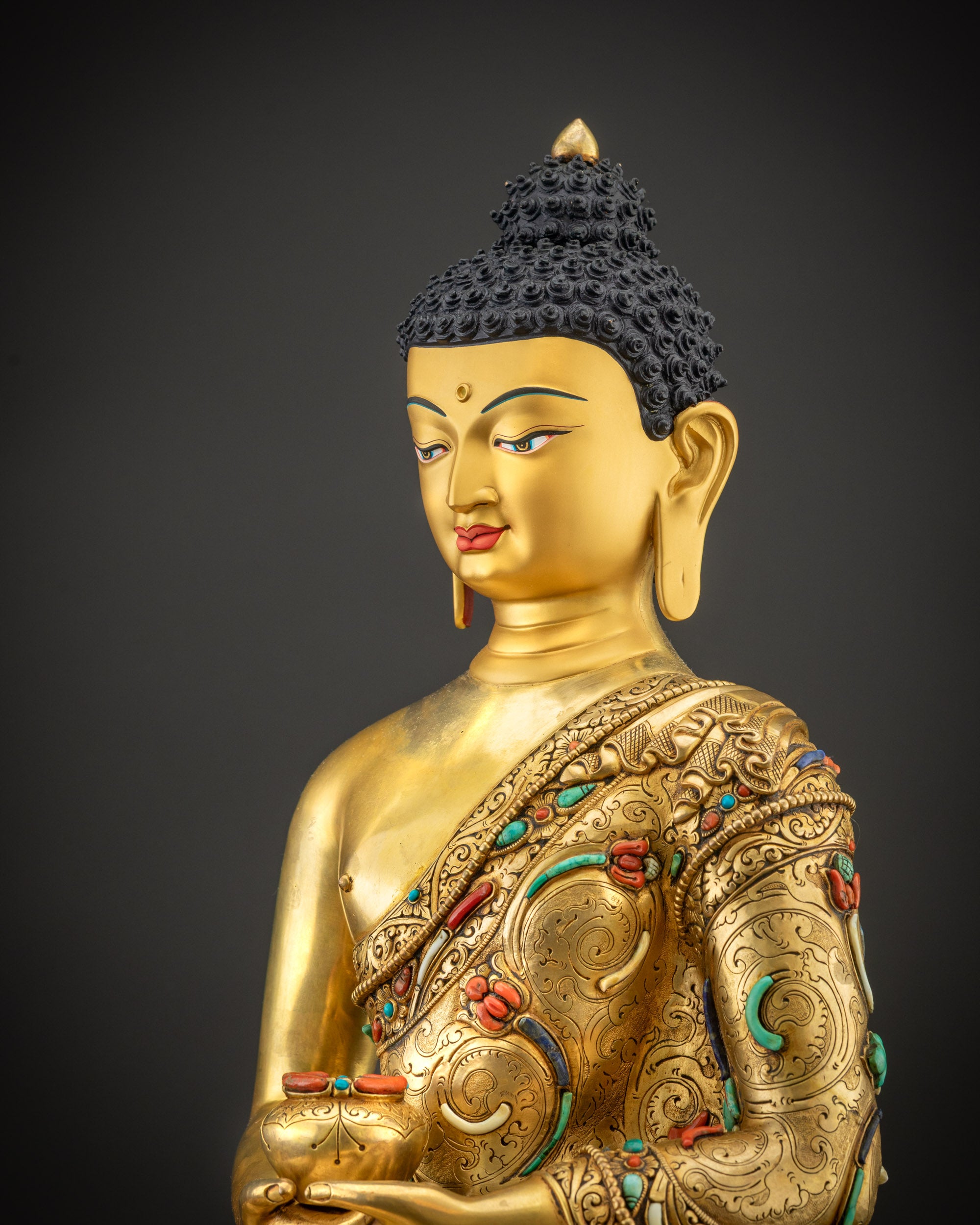 Detailed side view of Amitabha Buddha Statue, floral filigree and gemstone adornments