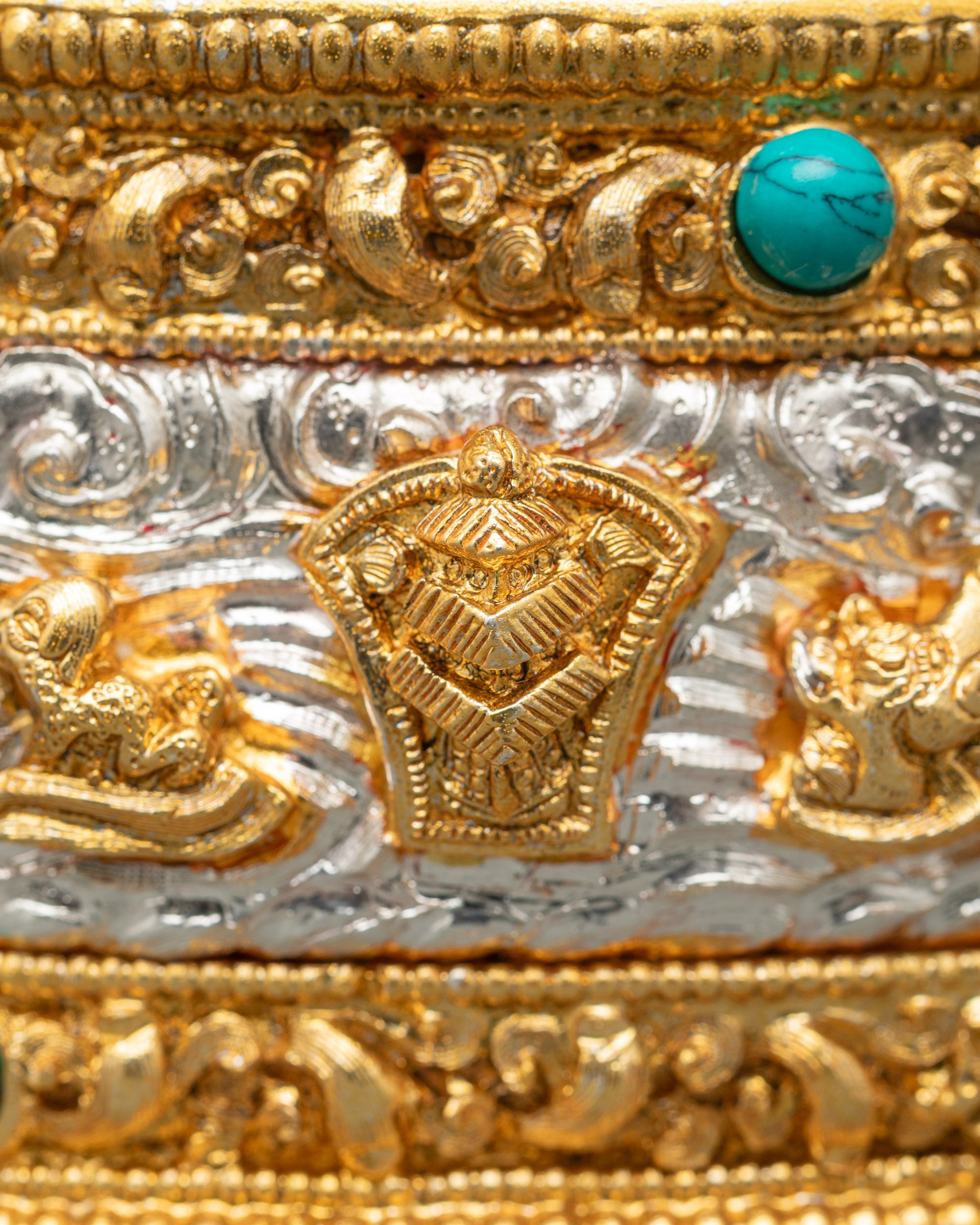 Detailed side view of Kusum Mandala Torma highlighting five raised spires and decorations