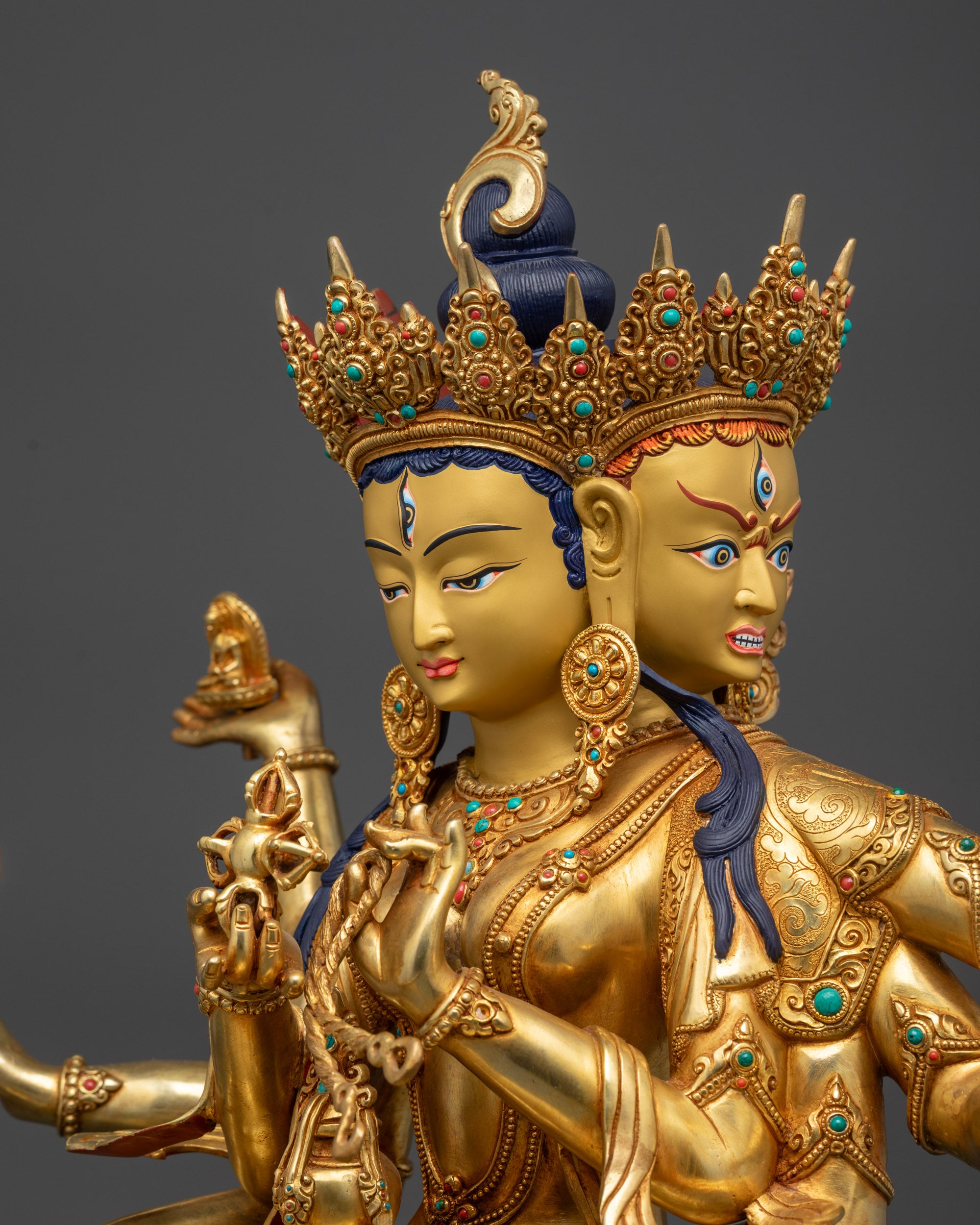 Detailed side view of Namgyalma statue with ornaments and semi-precious stones