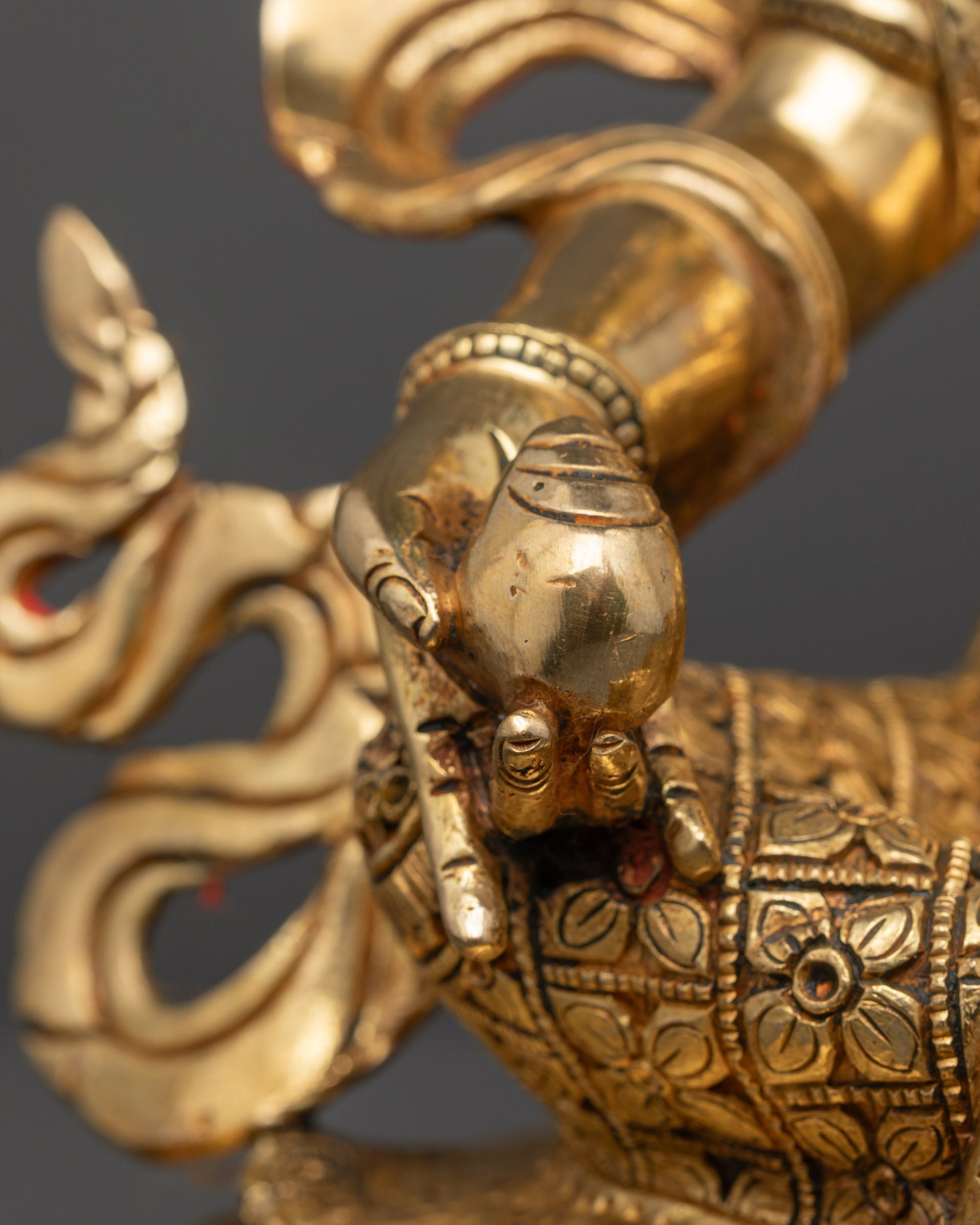 Detailed side view of Nepalese handcrafted Jambhala Statue