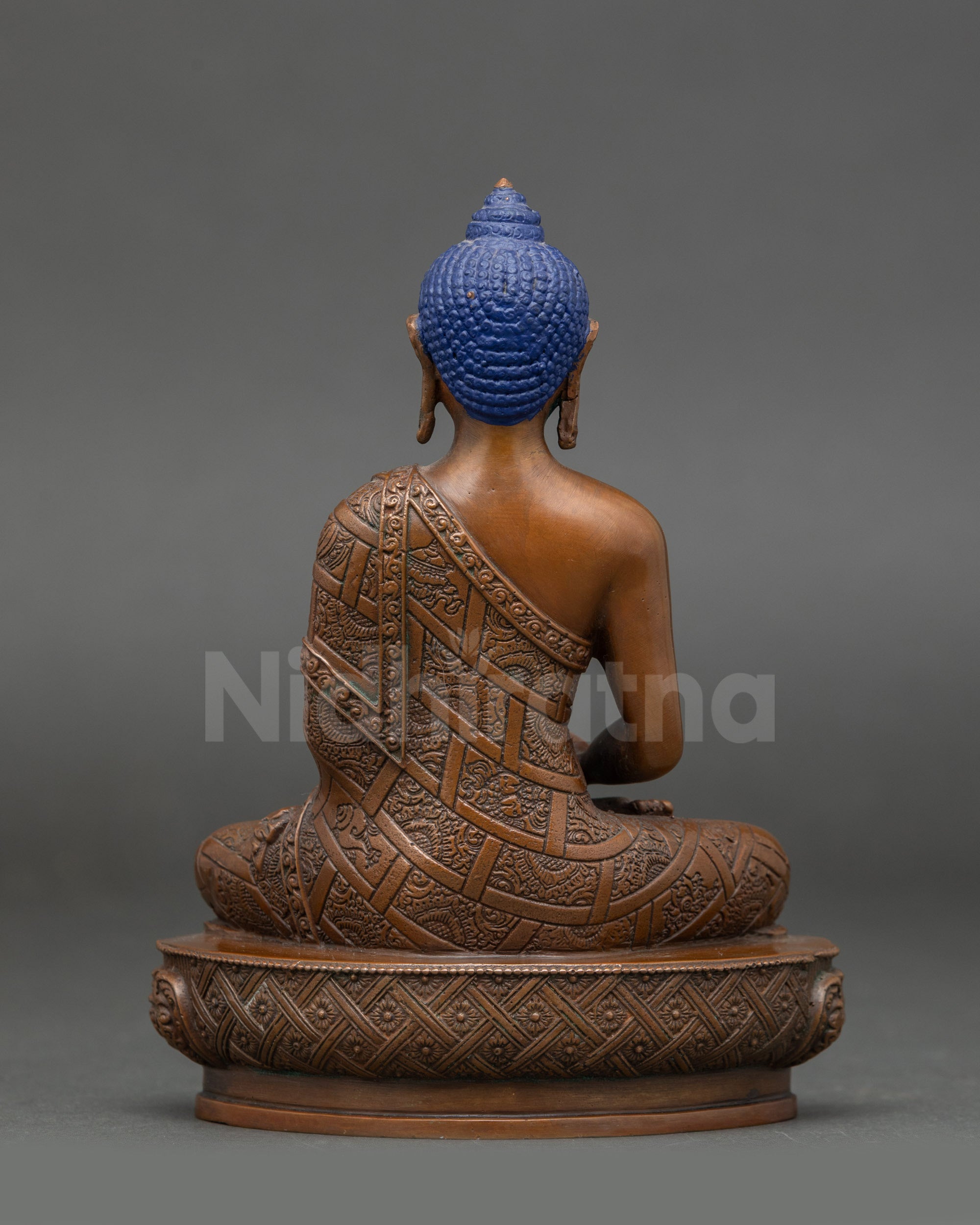 Detailed view of Buddha of Infinite Light serene expression chemically oxidized Himalayan sculpture Nepal