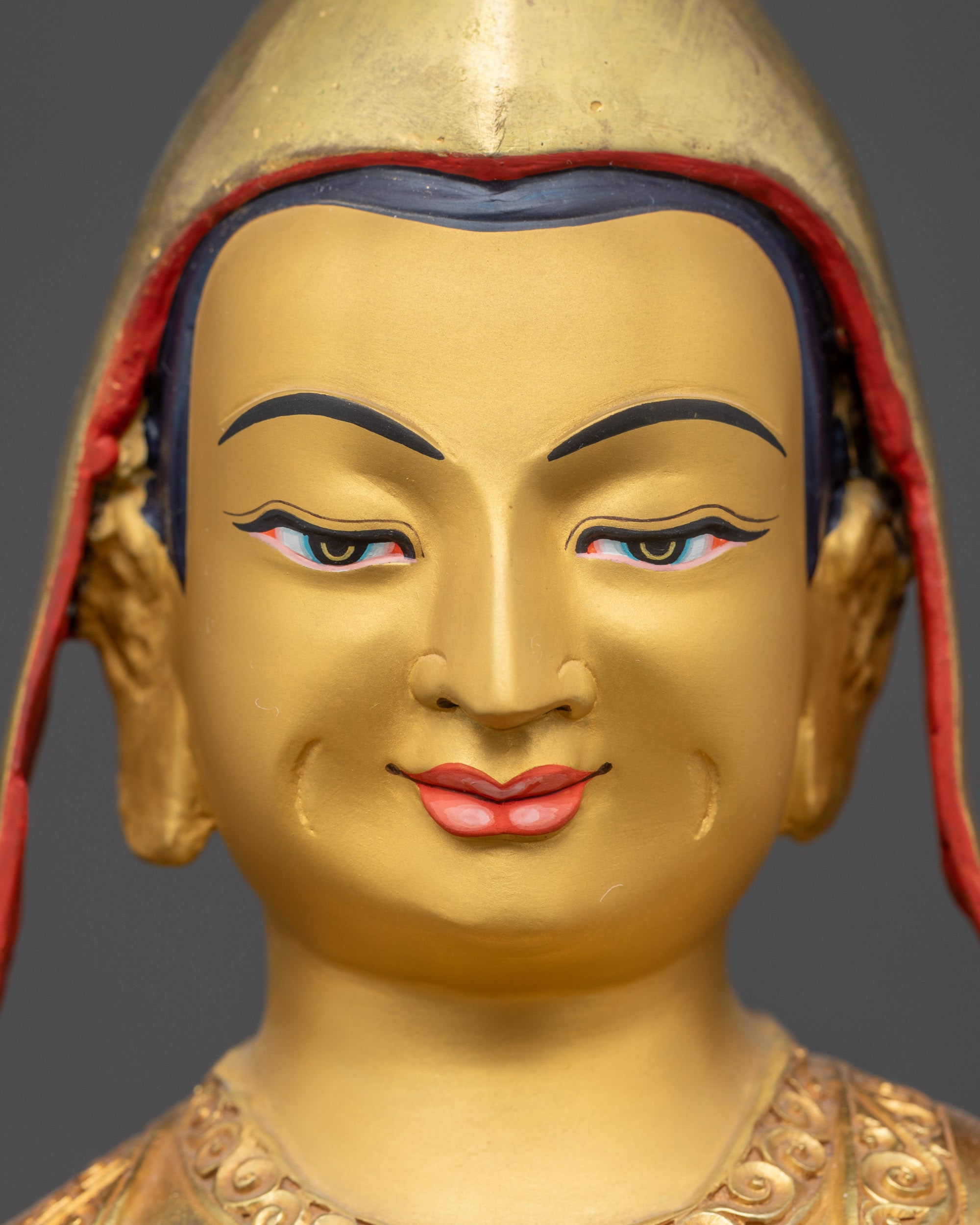 Dipankara Atisha detailed face close up highlighting meditative golden features