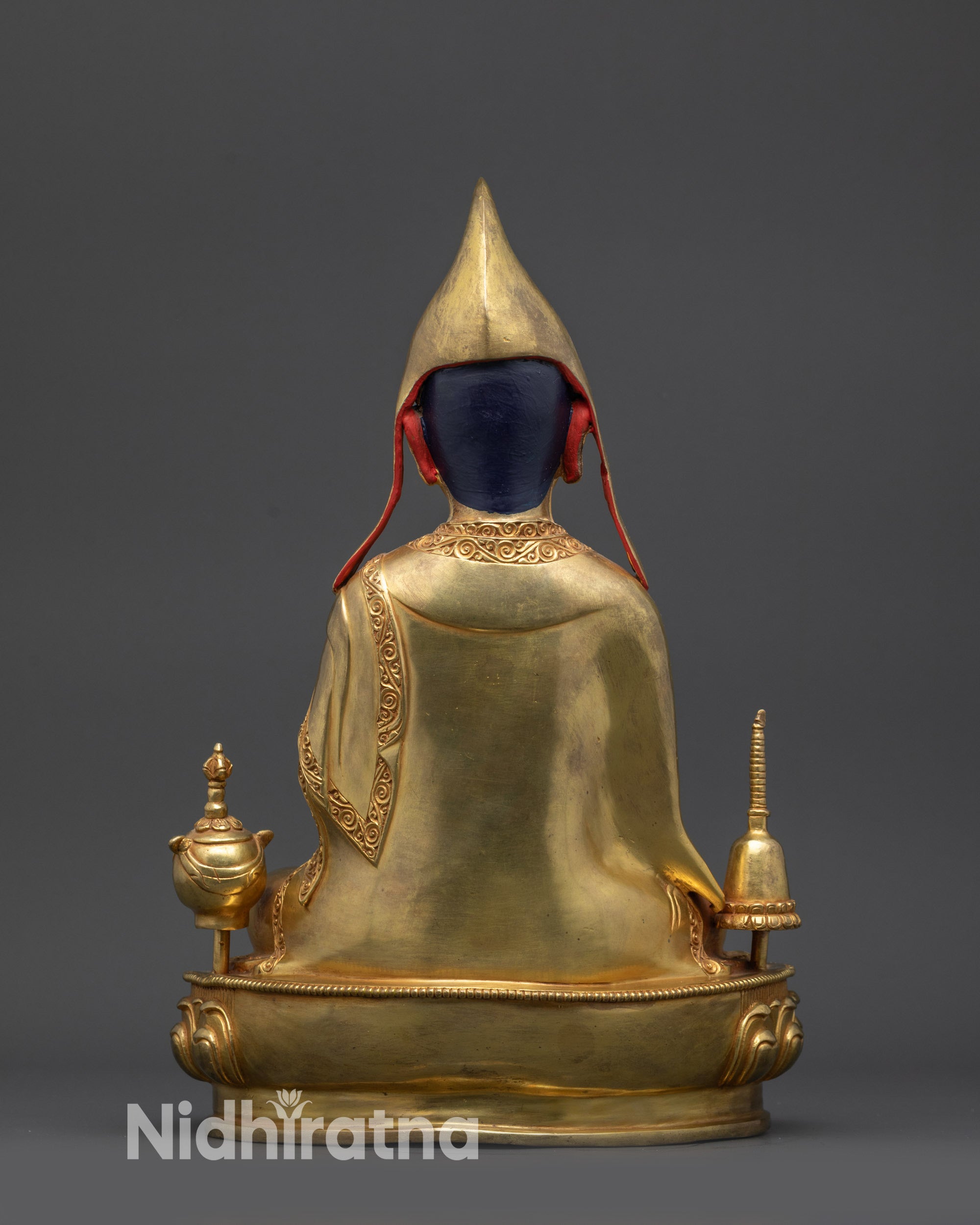 Dipankara Atisha statue rear view highlighting traditional Himalayan craftsmanship