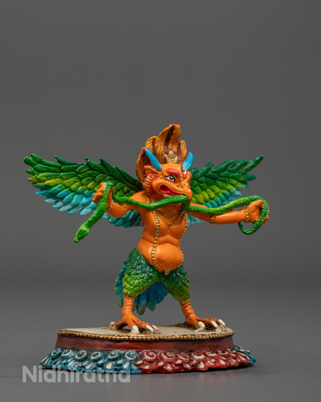 Divine Garuda Dev statue known as Vishnu’s mount, showcasing loyalty, strength, and protection in colorful detailed design