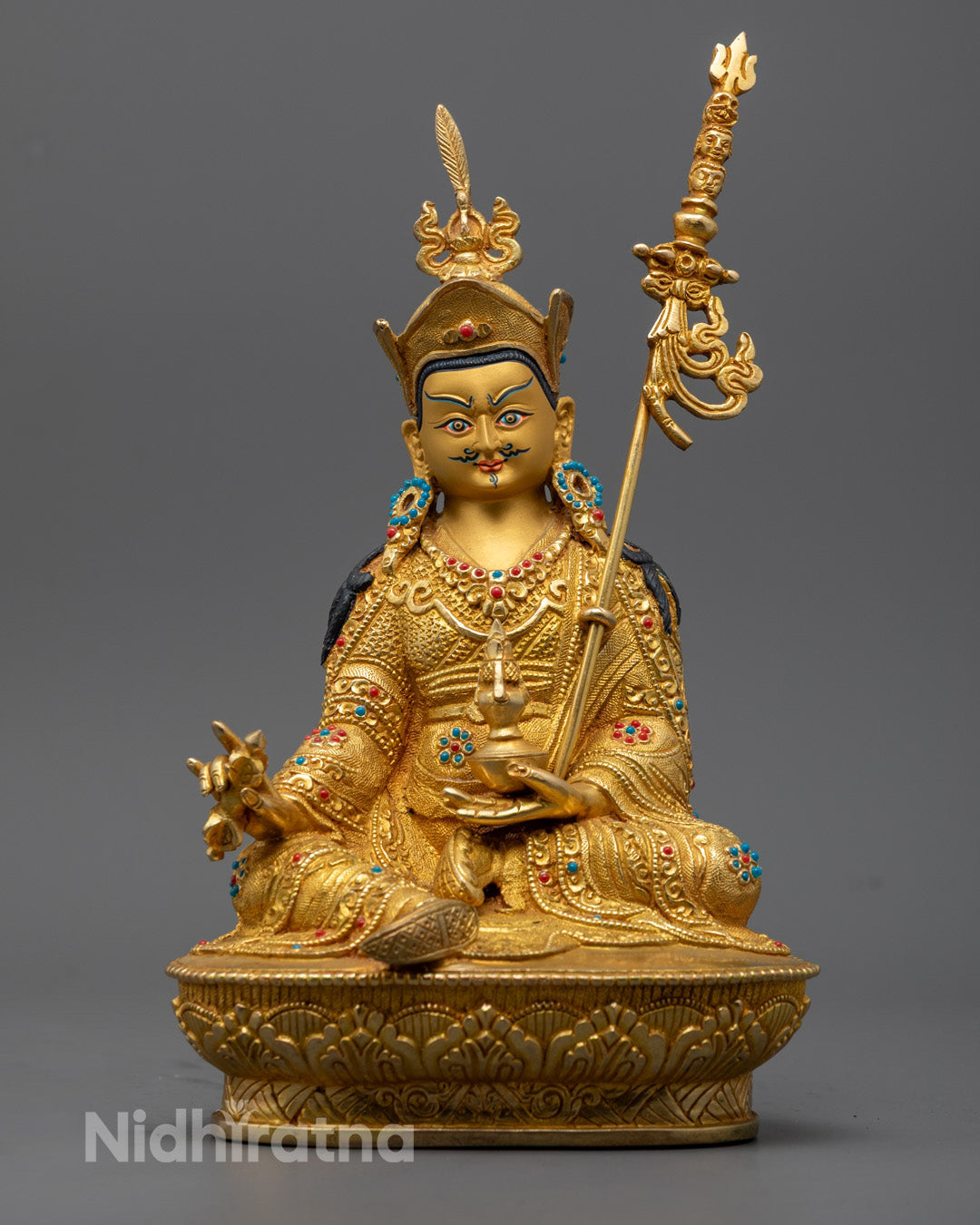 Divine Guru Rinpoche Statue with pure gold-gilded face, fire-gilded golden copper body, and intricate hand-carved details
