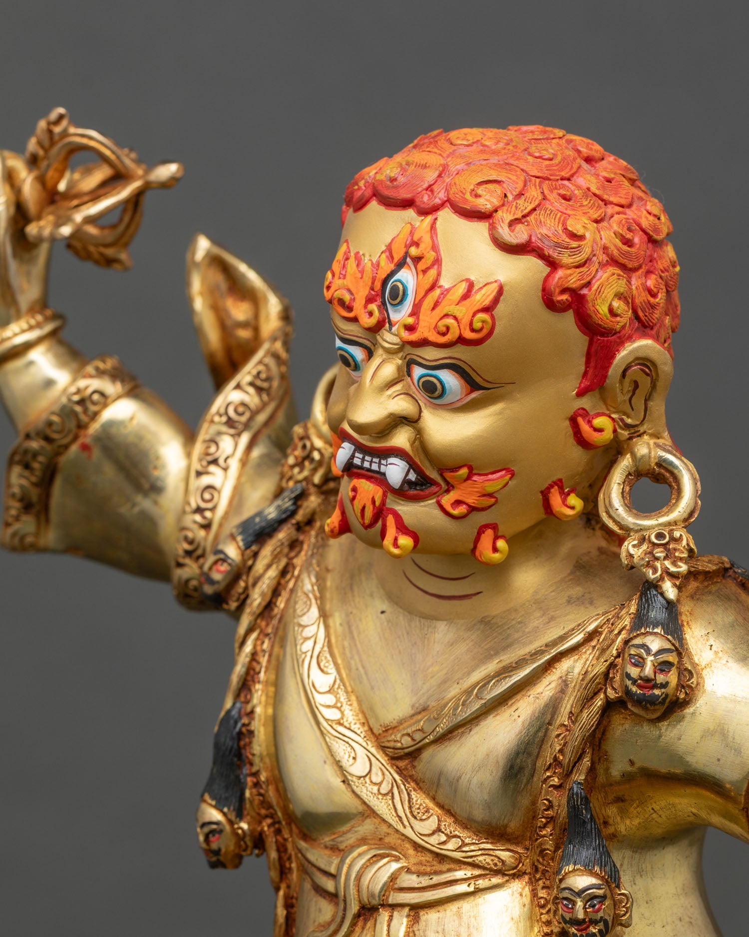 Dorje Drolo statue side detail with tigress and engraved fur texture