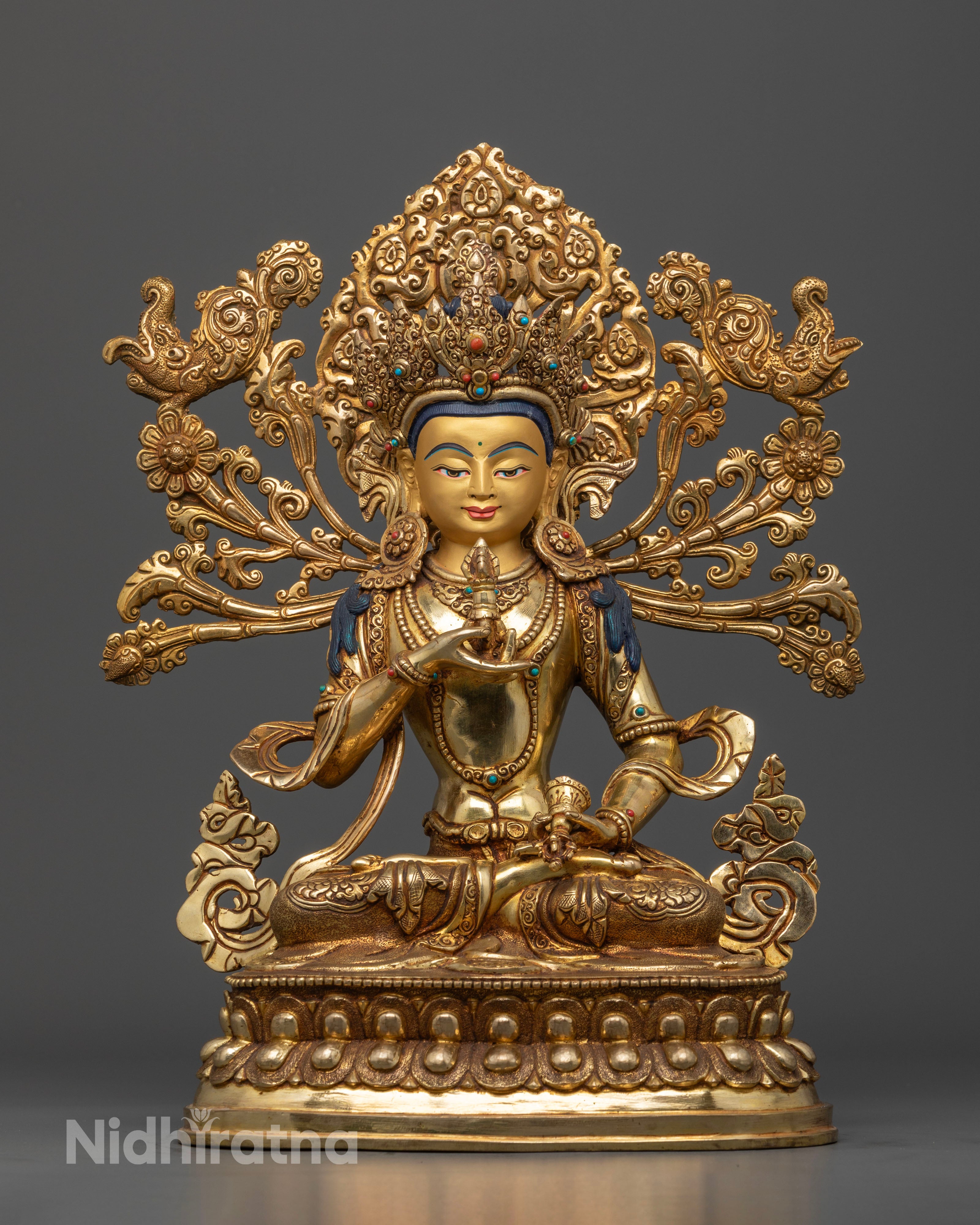 Dorje Sempa (Vajrasattva) statue seated elegantly on a lotus throne, adorned with a radiant five-jeweled crown, holding a vajra and bell symbolizing indestructible compassion and profound wisdom.