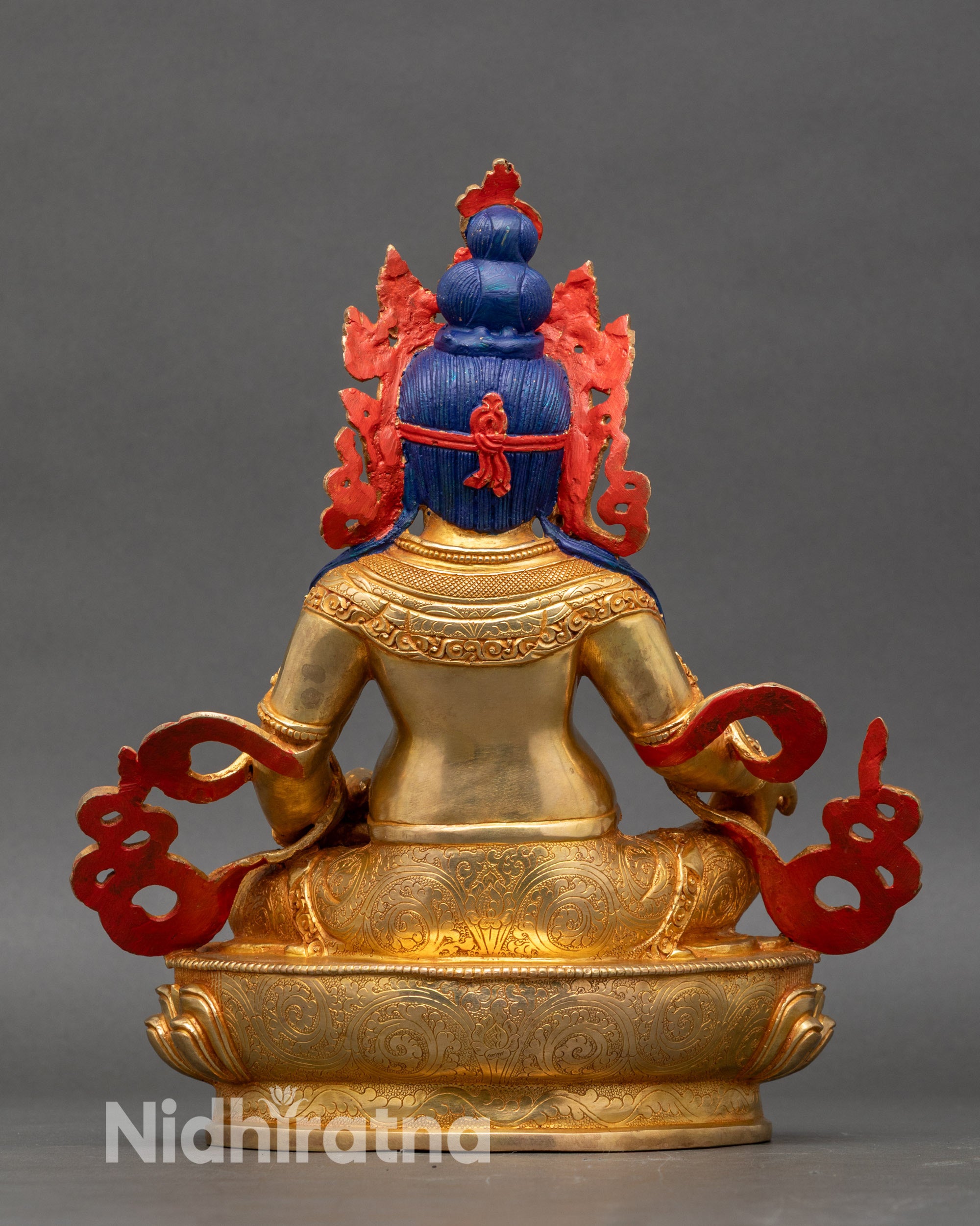 Back of Dzambhala statue, hand-carved copper, gold-gilded Tibetan Wealth Deity with Newari artisan details