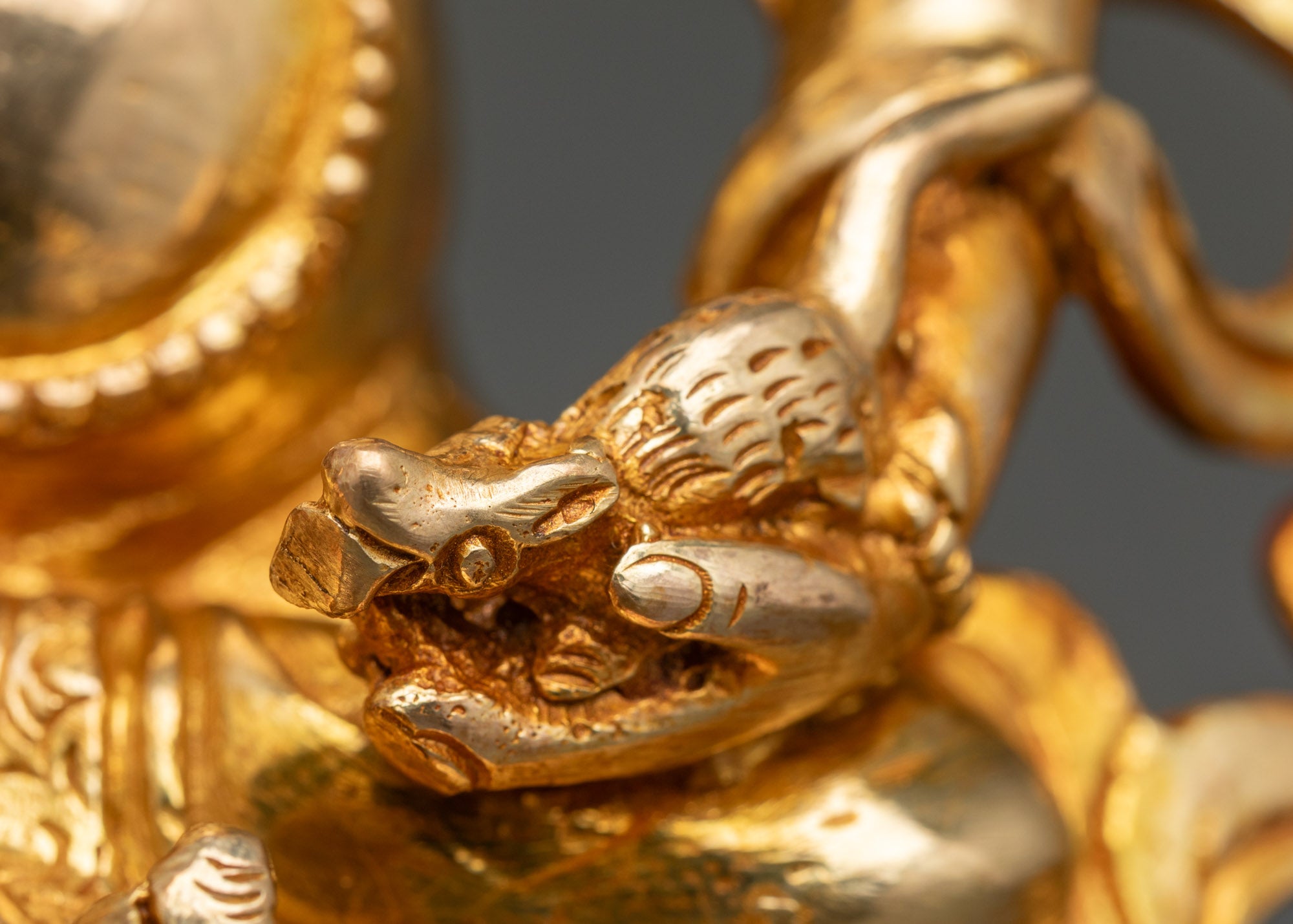 Dzambhala holding mongoose, Buddhist God of Wealth, hand-crafted in Patan, Nepal