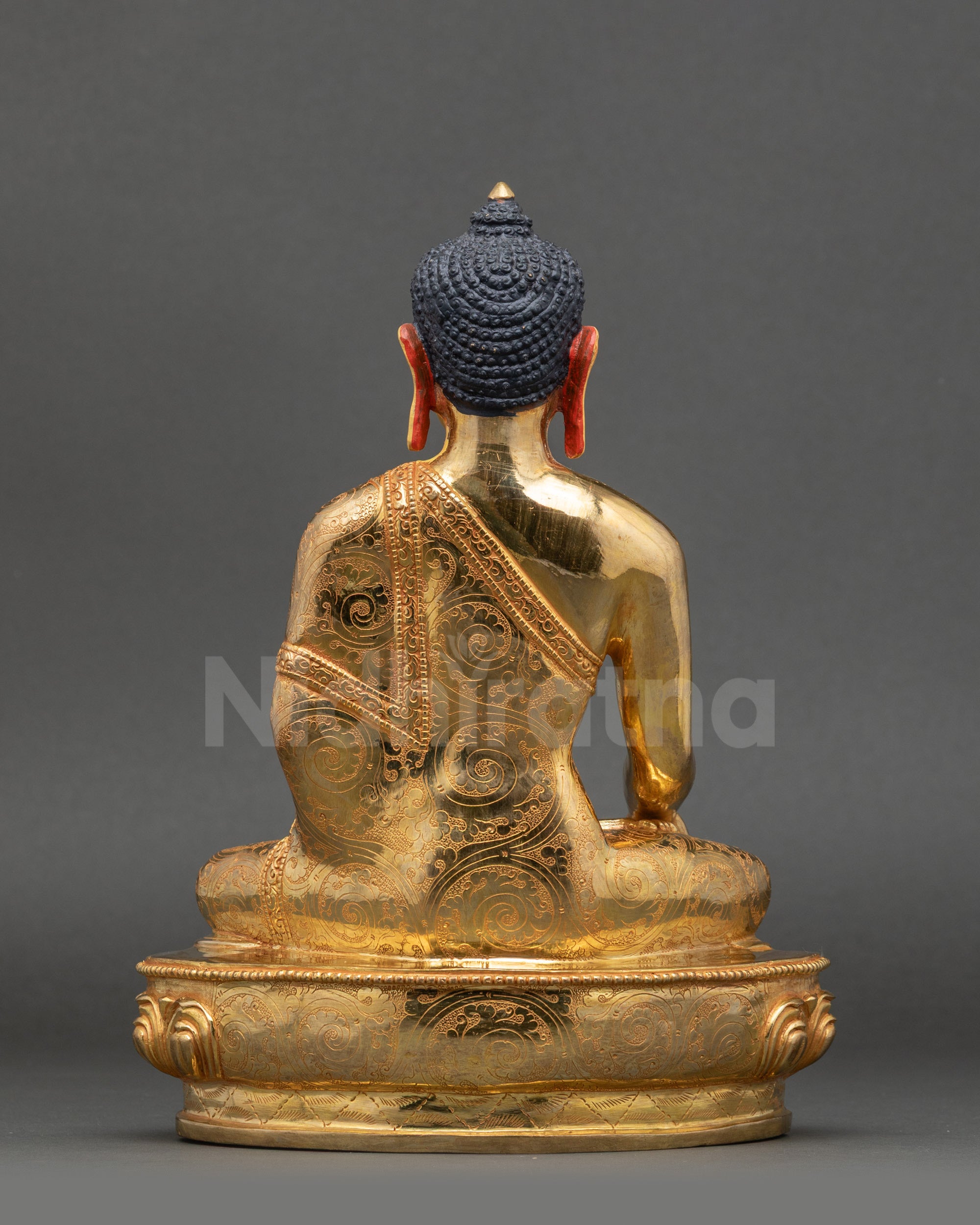Enlightened One Buddha Statue back view detailed lotus pedestal copper artwork
