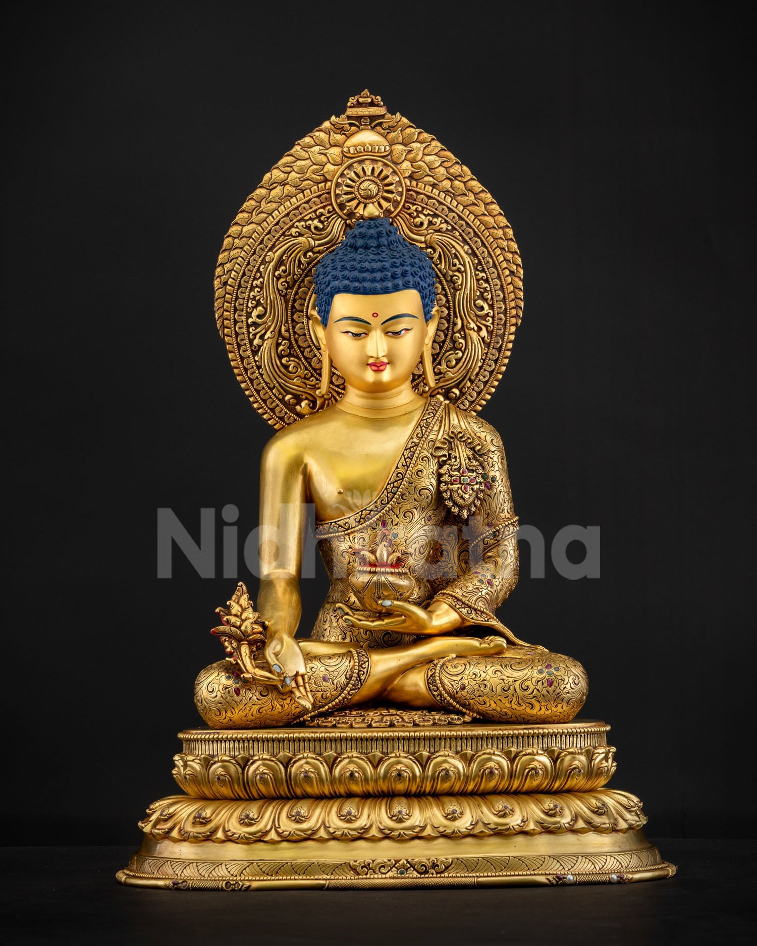 Exclusive Healing Buddha Bhaisajyuru statue handcrafted in Nepal with triple gold fire gilding and floral halo