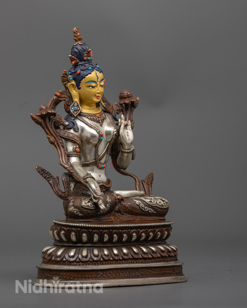 Exquisite Nepalese White Tara sculpture featuring enlightened femininity and detailed lotus base