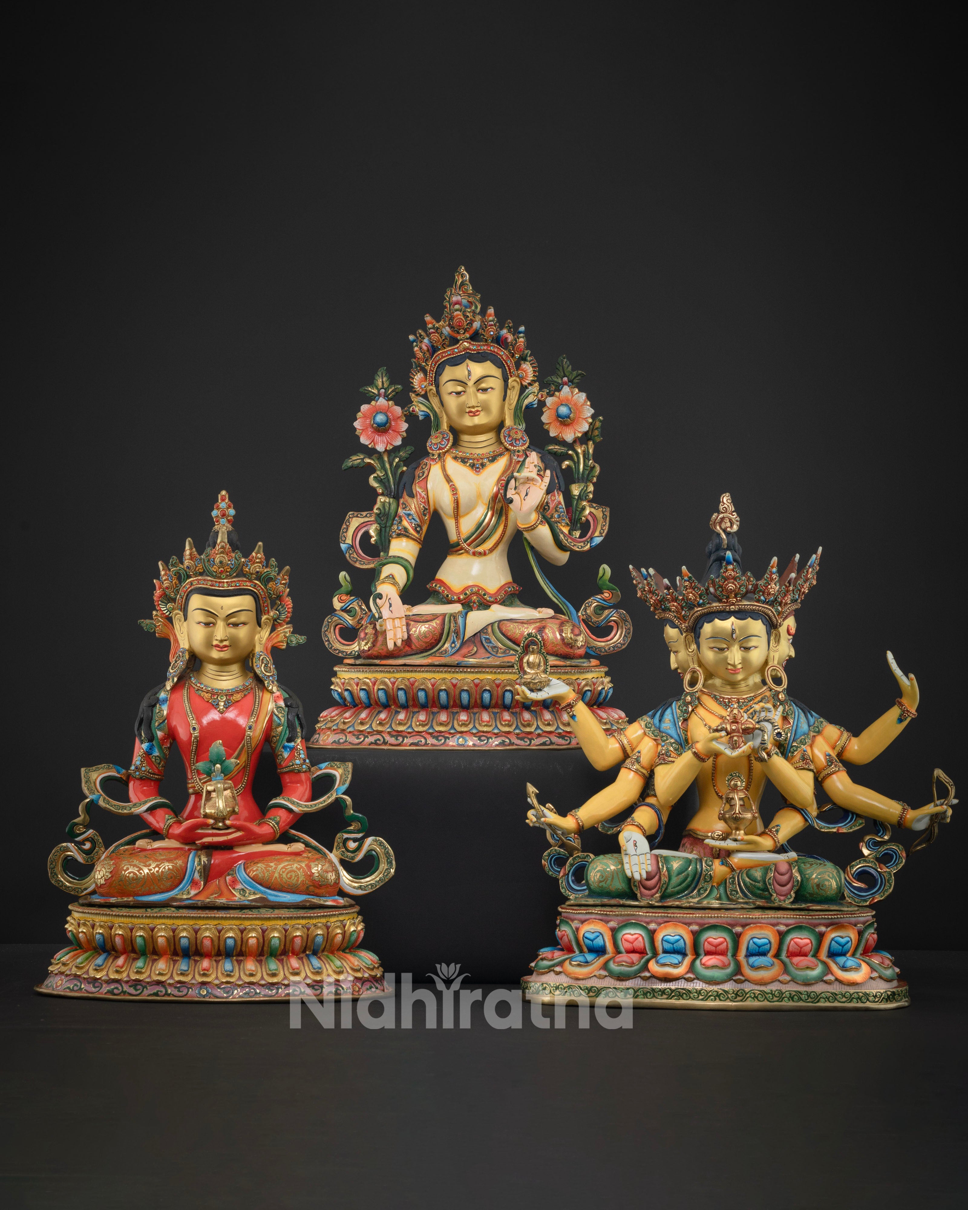 Exquisitely handcrafted gold-gilded statue set featuring White Tara at the center, with intricate hand-painted details and vibrant acrylic colors, symbolizing healing, compassion, and the divine essence of longevity.