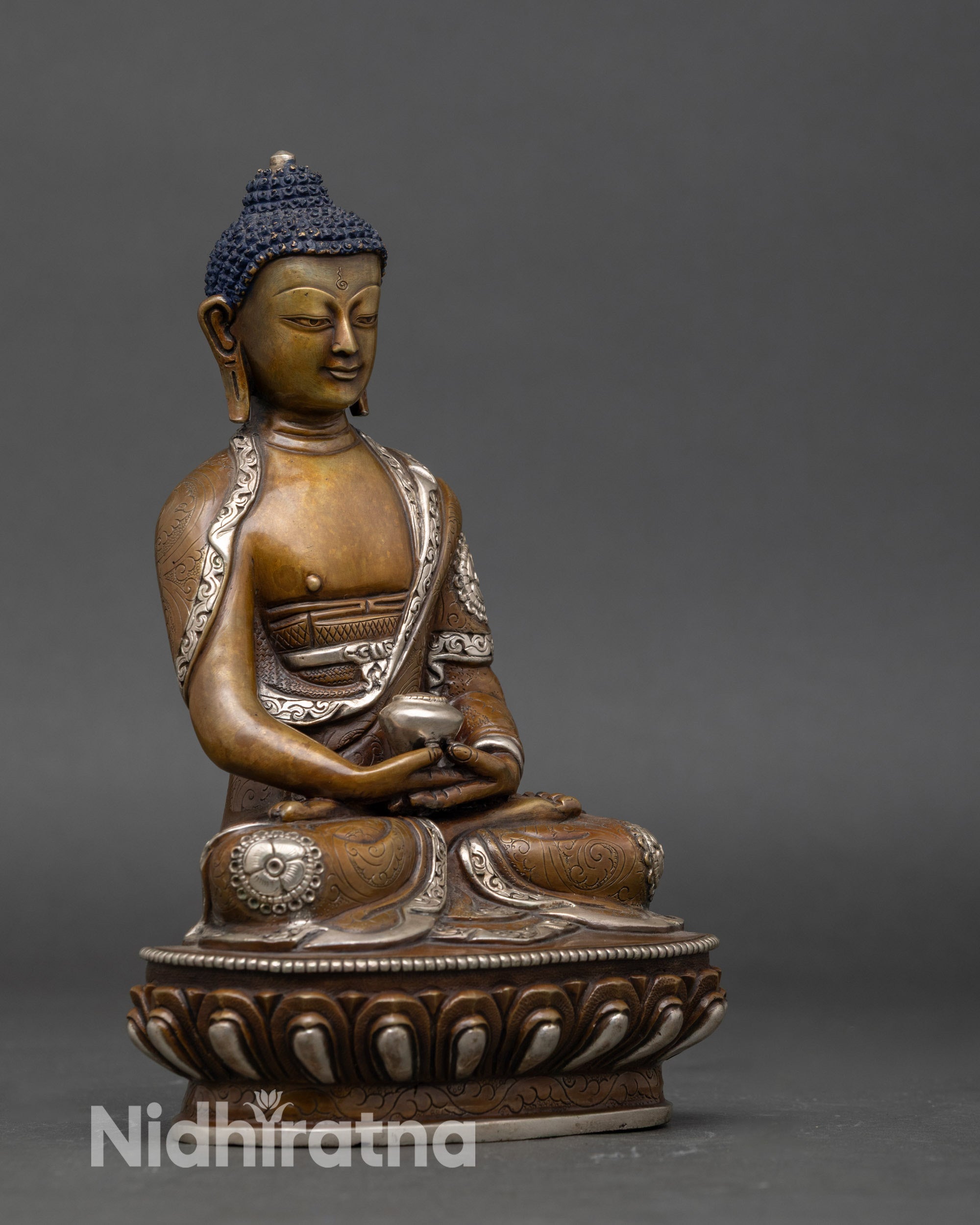 Side view of Amitabha Buddha statue handcrafted by Newari artisan in Patan